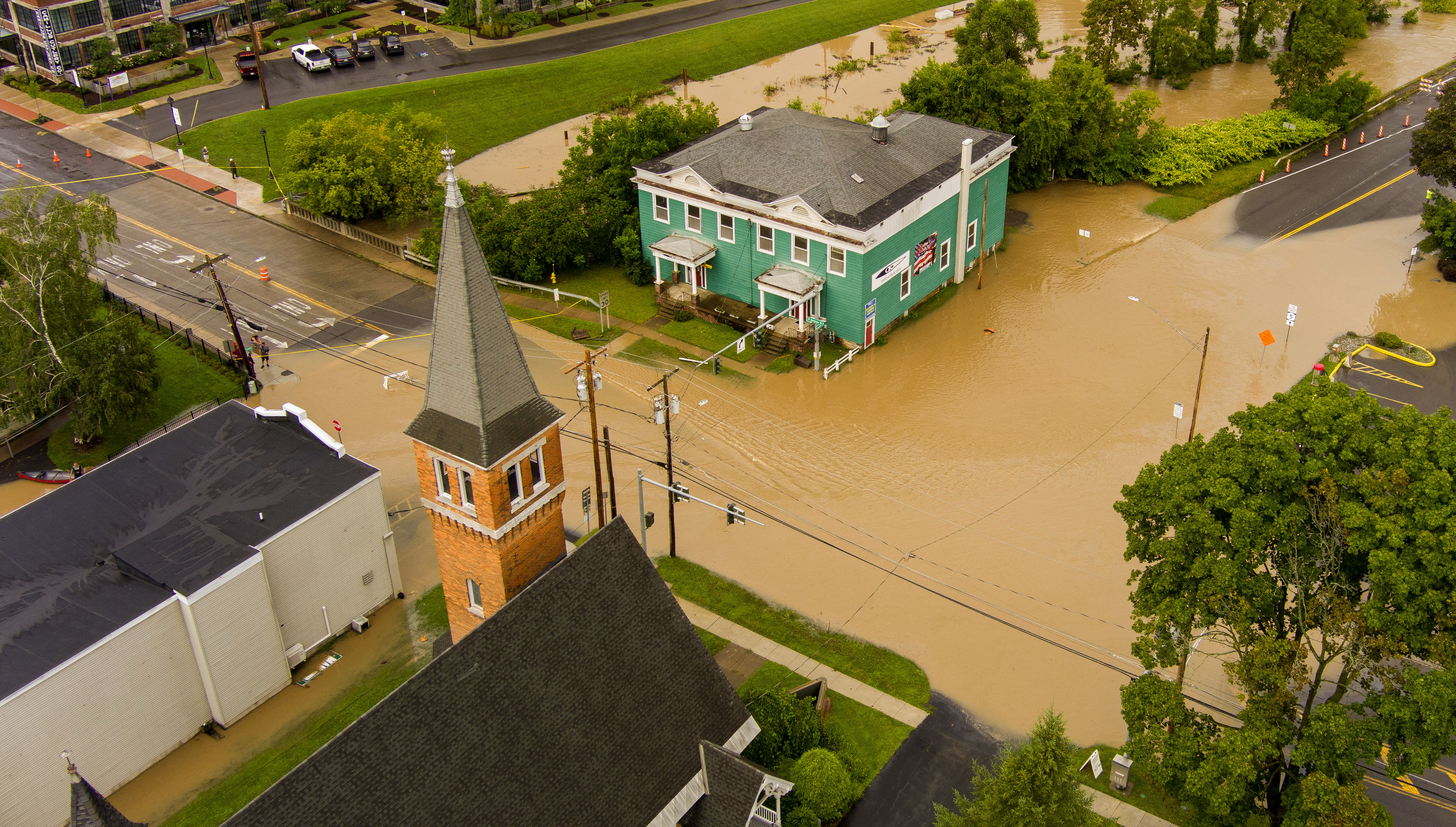 An aerial view of the Village of Camillus where Ninemile Creek flooded streets August 19, 2021, after heavy rainfall.