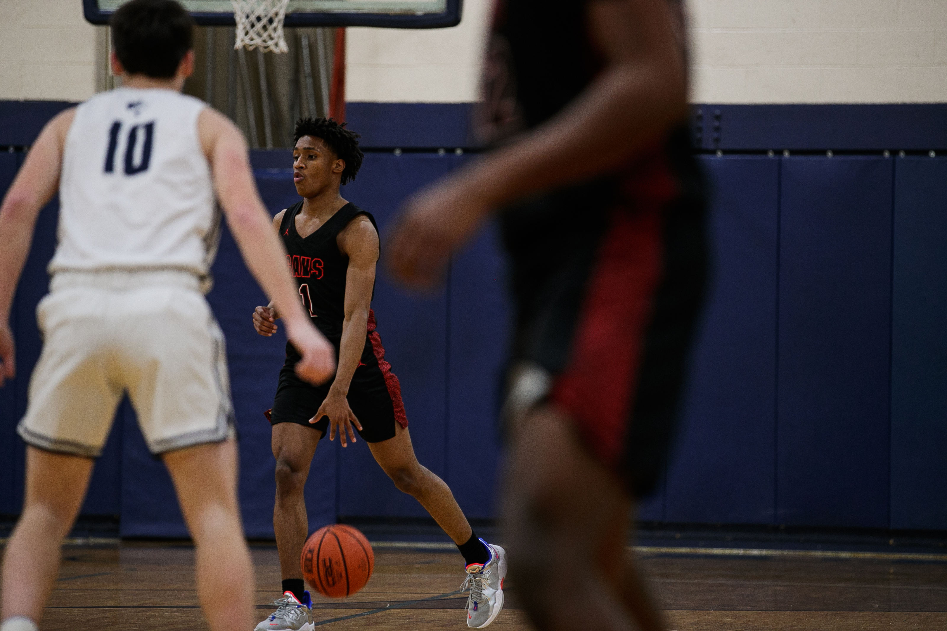 Carrollton boys varsity basketball team defeats Hemlock Huskies