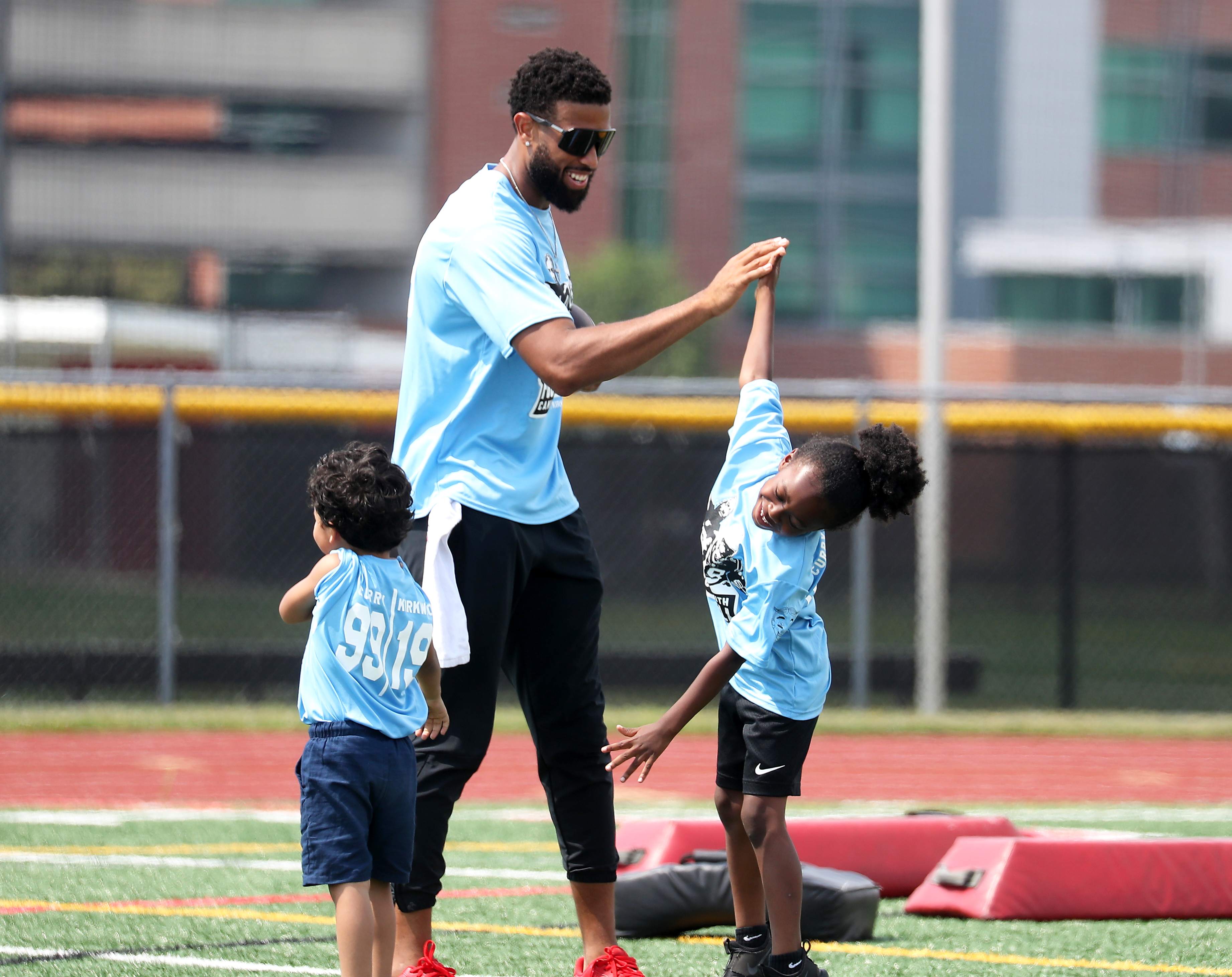 Eagle Vinny Curry Holding Ocean City Youth Football Camp