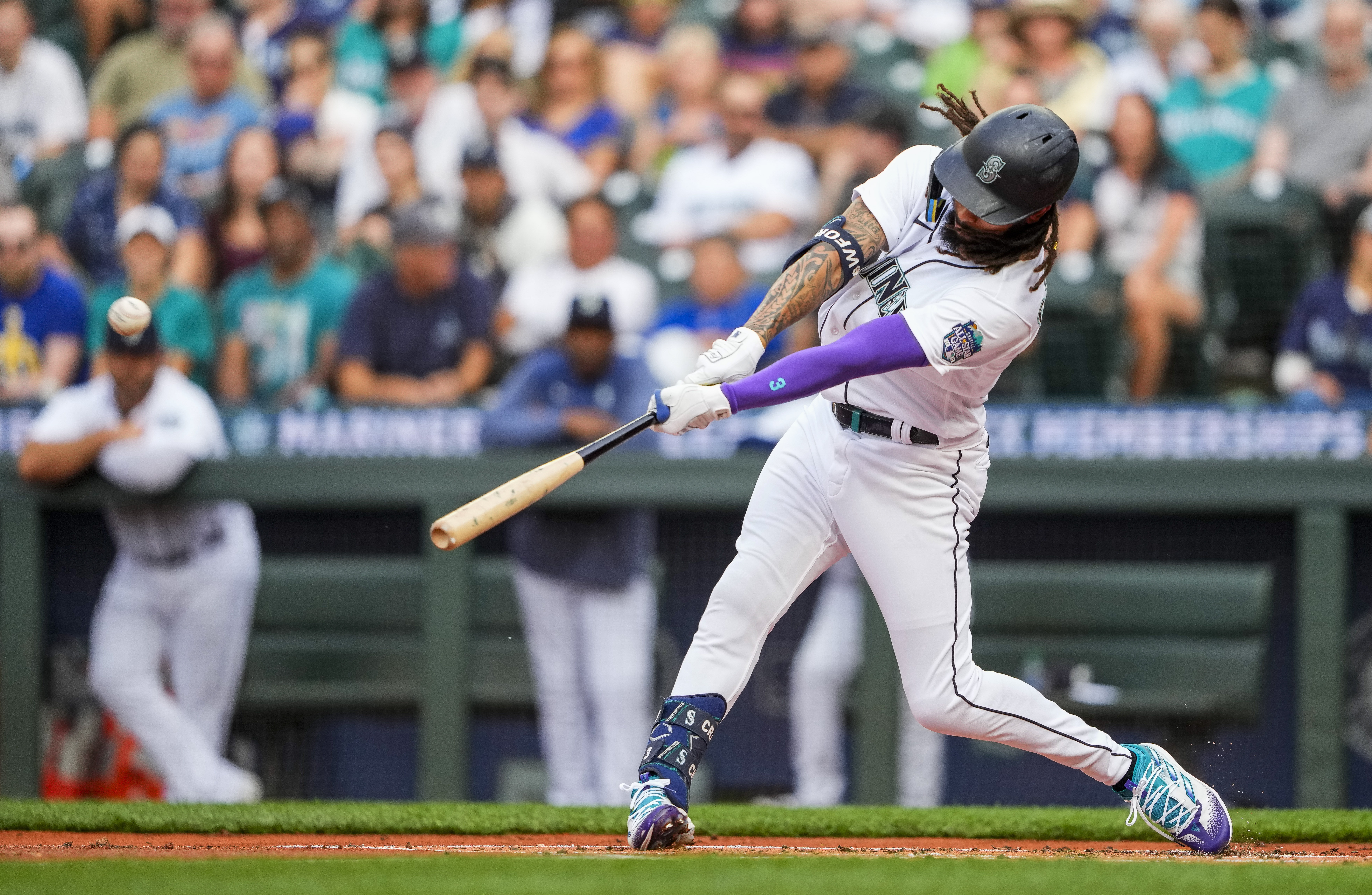 Seattle Mariners third baseman Eugenio Suarez jogs the bases after hitting  a home run against the Washington Nationals in a baseball game Monday, June  26, 2023, in Seattle. The Mariners won 8-4. (