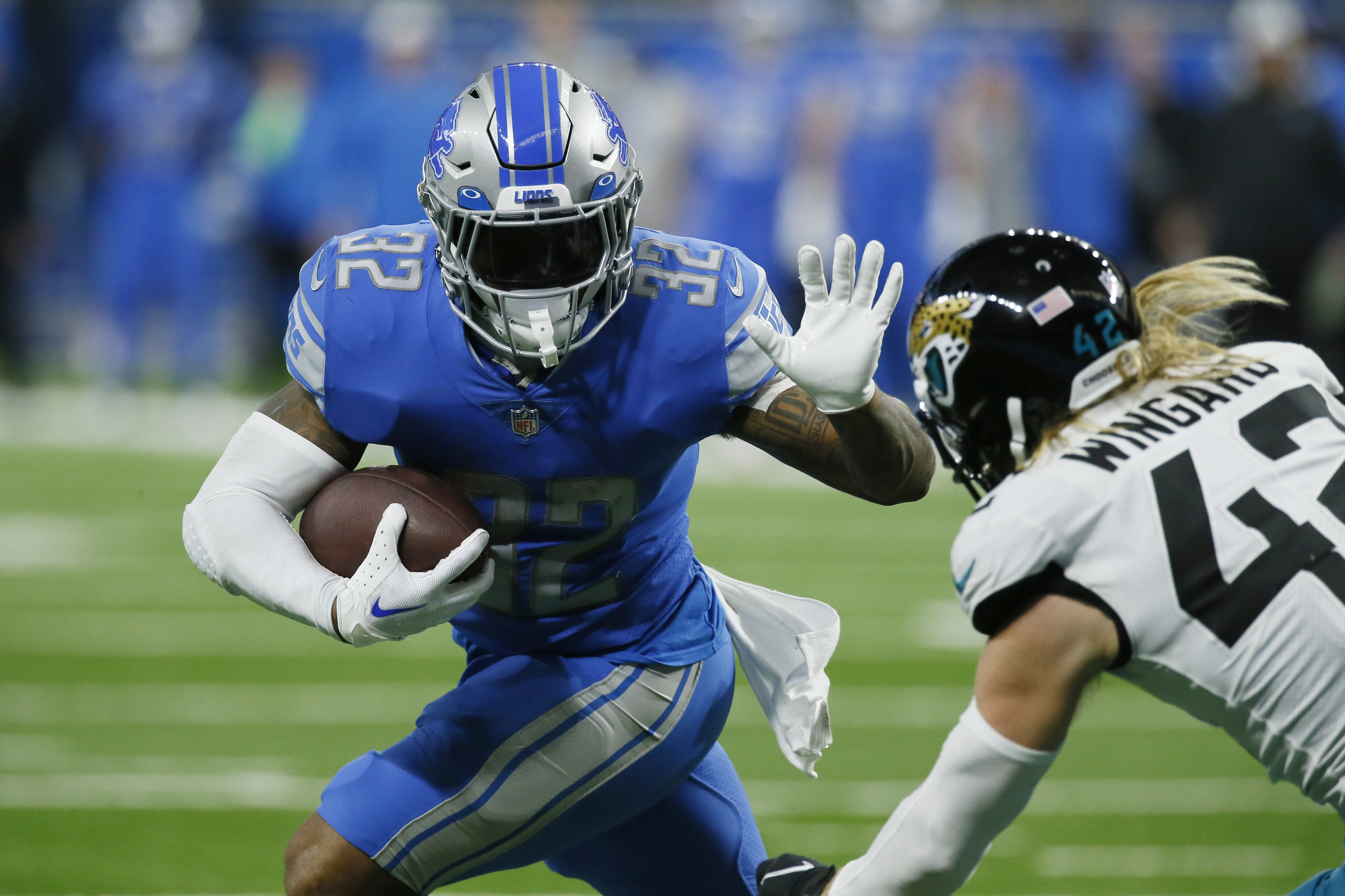 Detroit Lions guard Kayode Awosika (74) reacts at the conclusion