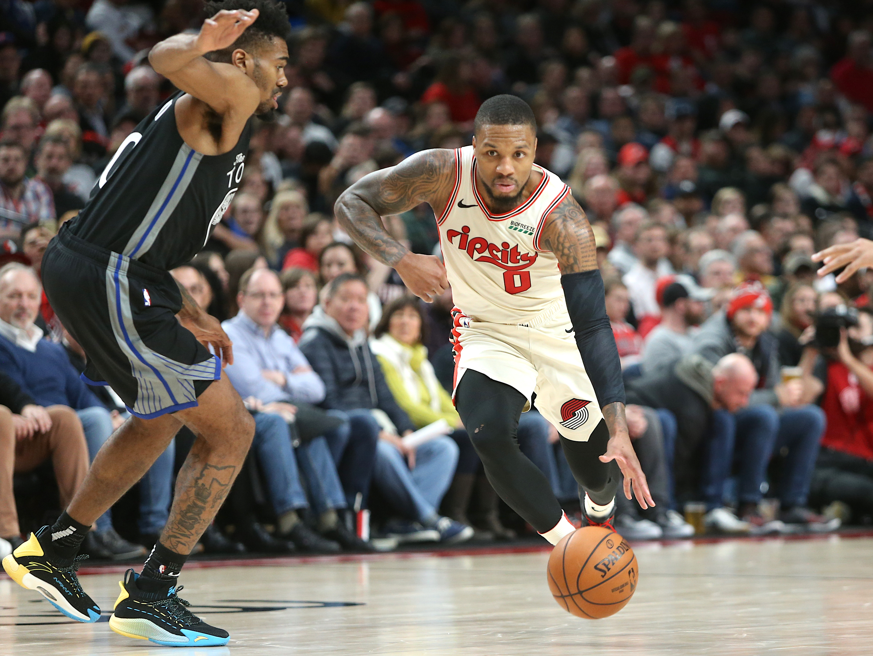 Portland Trail Blazers’ Damian Lillard enters the car