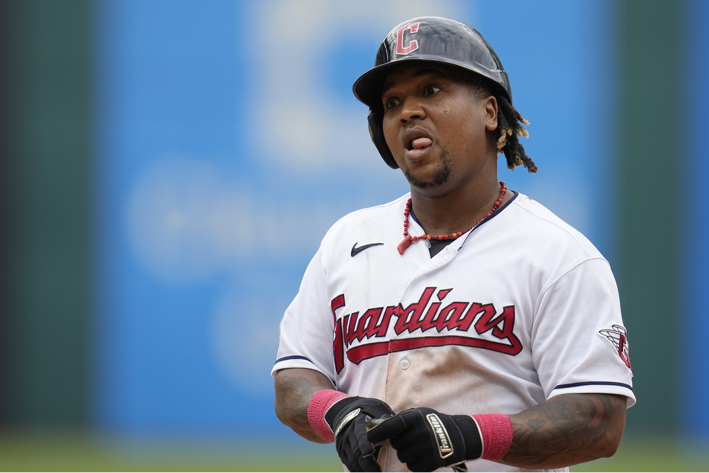 Cleveland Guardians' Jose Ramirez follows through on a double in