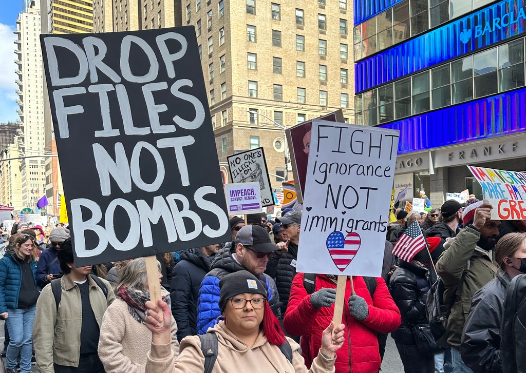 Photos: Tens of thousands march through Times Square in ‘No Kings ...