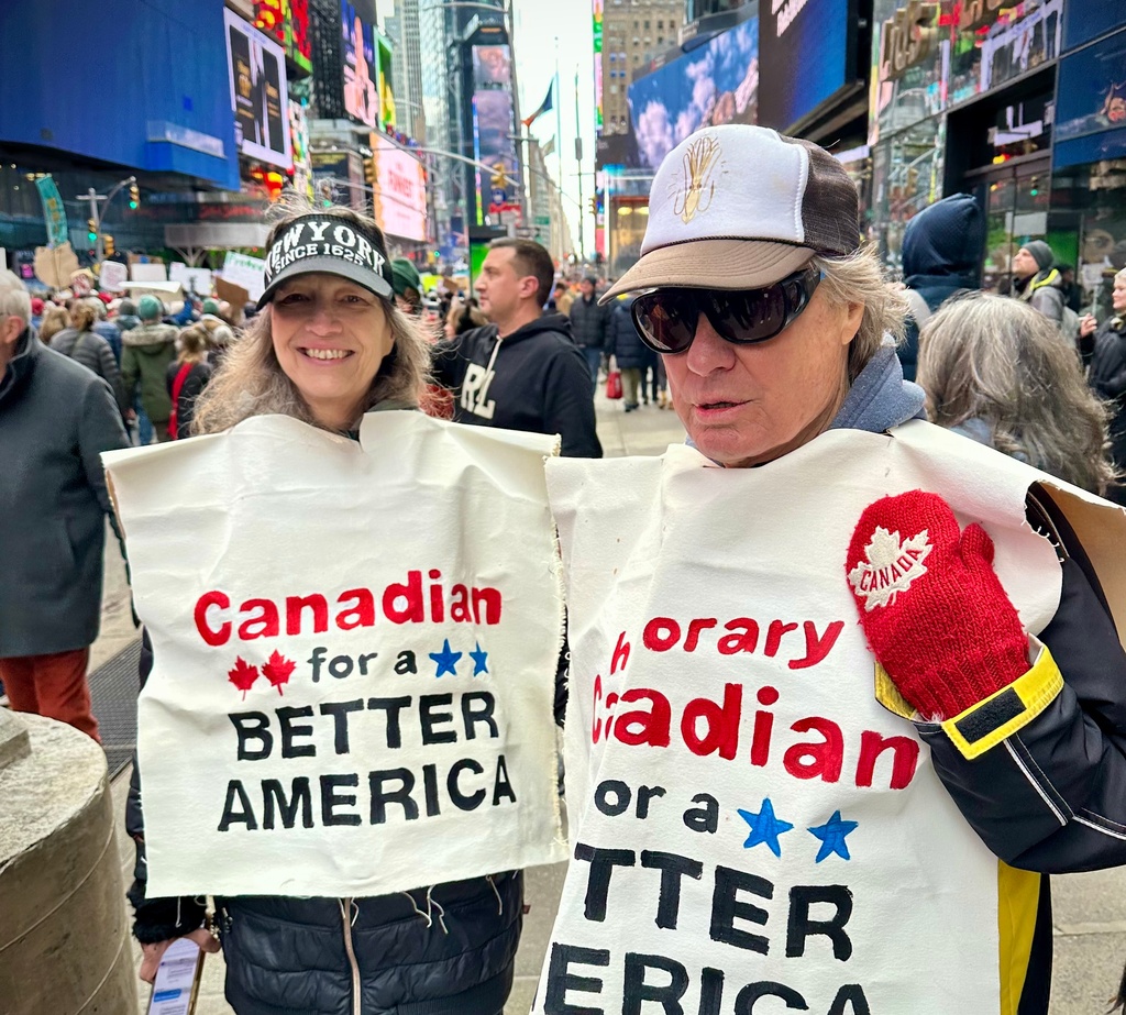 Photos: Tens of thousands march through Times Square in ‘No Kings ...