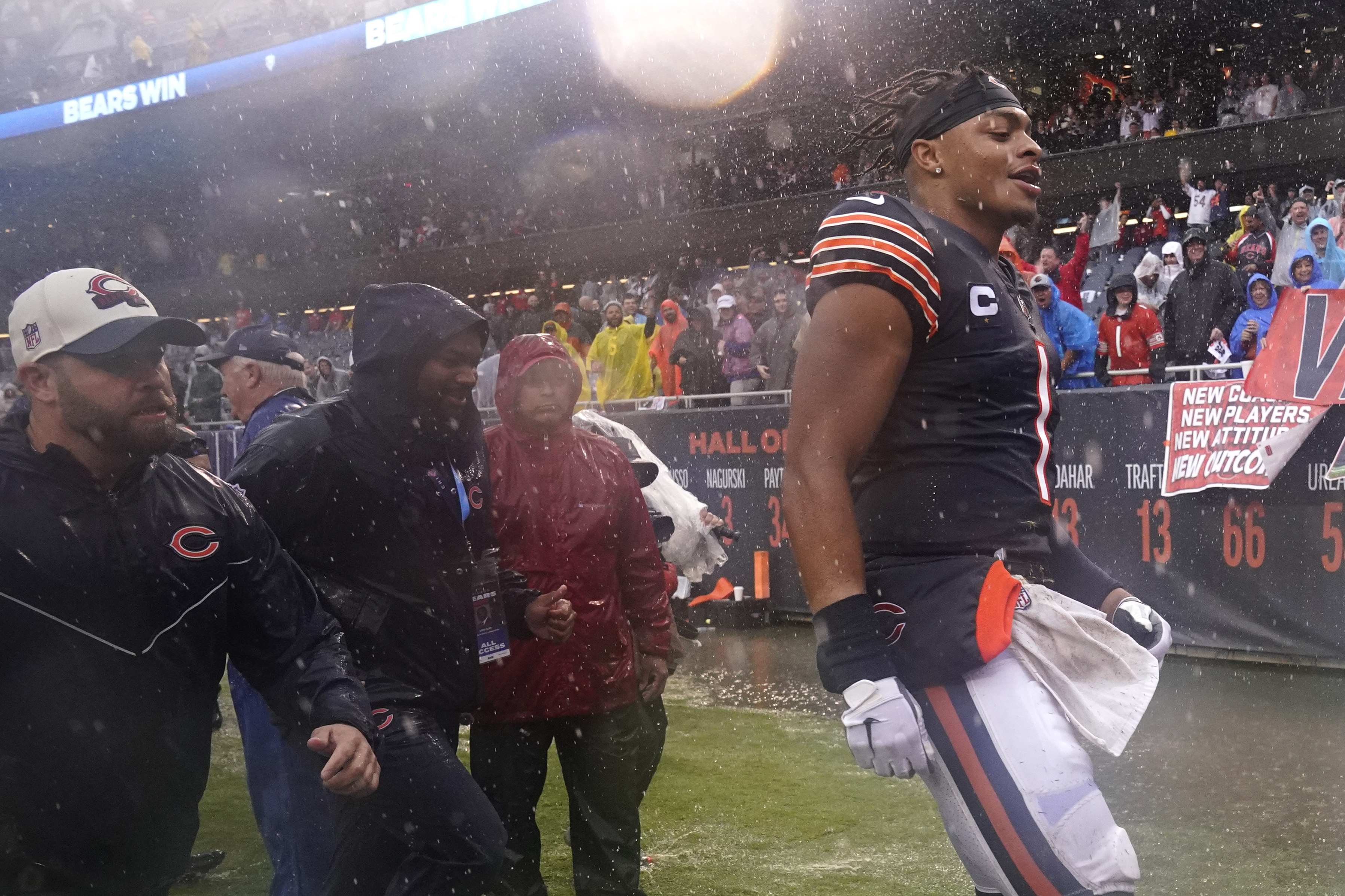 Justin Fields, Bears' Teammates Celebrate Rainy Win With Stylish