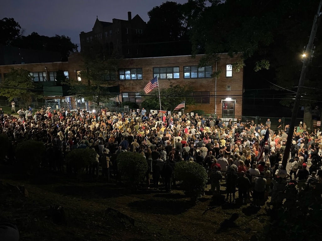 Staten Islanders protest migrant housing at the shuttered St. John
