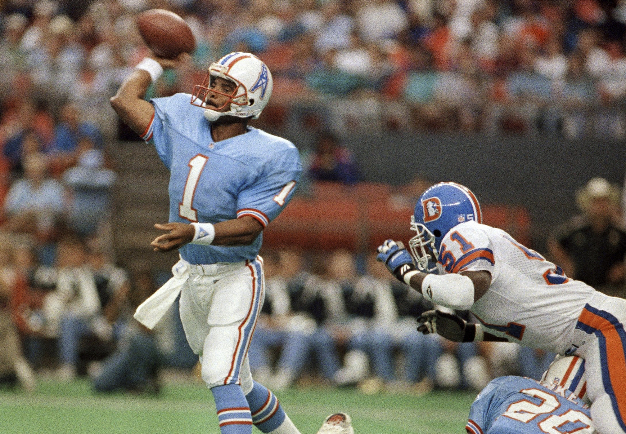 Think You Can Catch Footballs From Warren Moon?