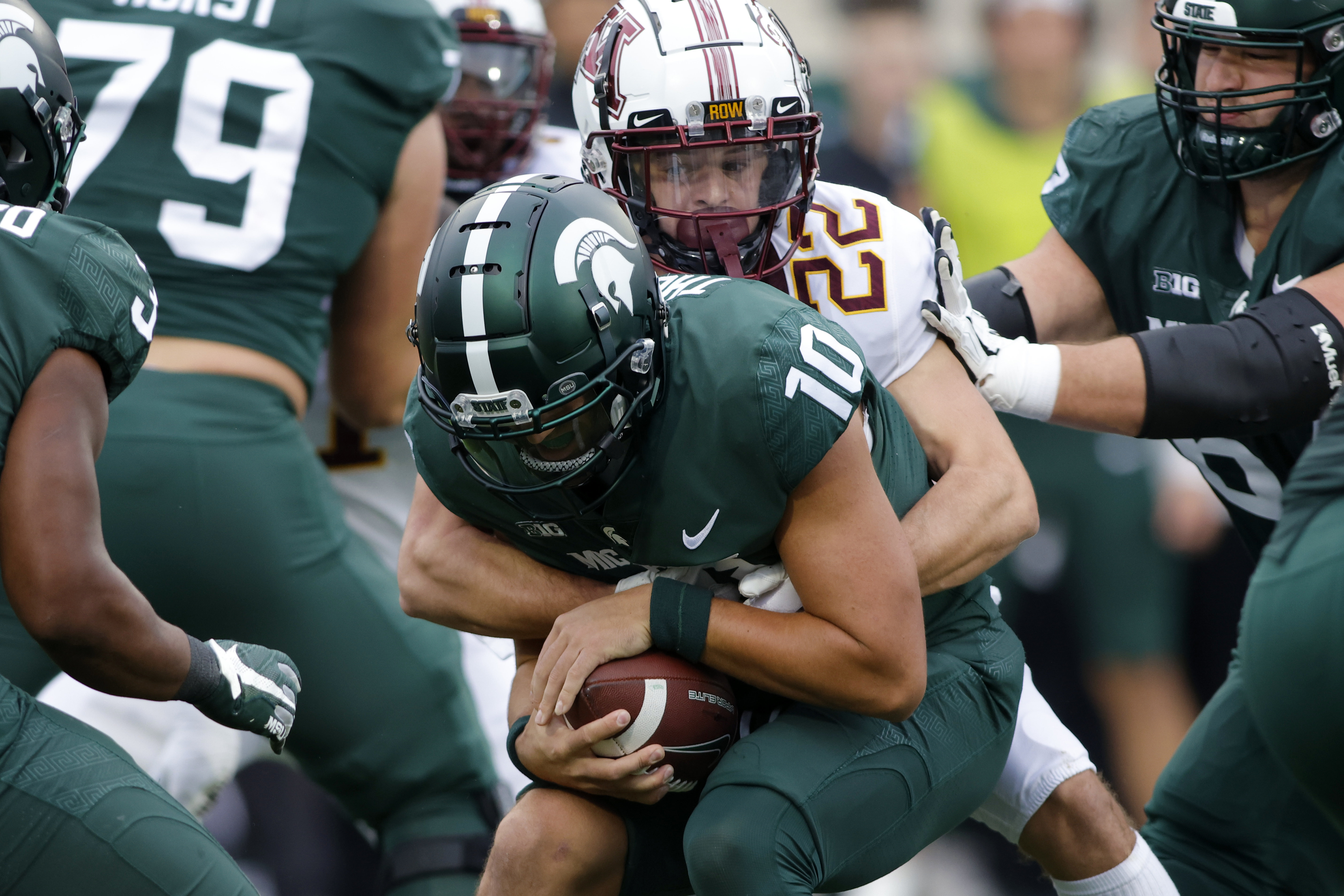 Snap counts, PFF grades: Noah Kim sharp, tackling an issue for Michigan  State 