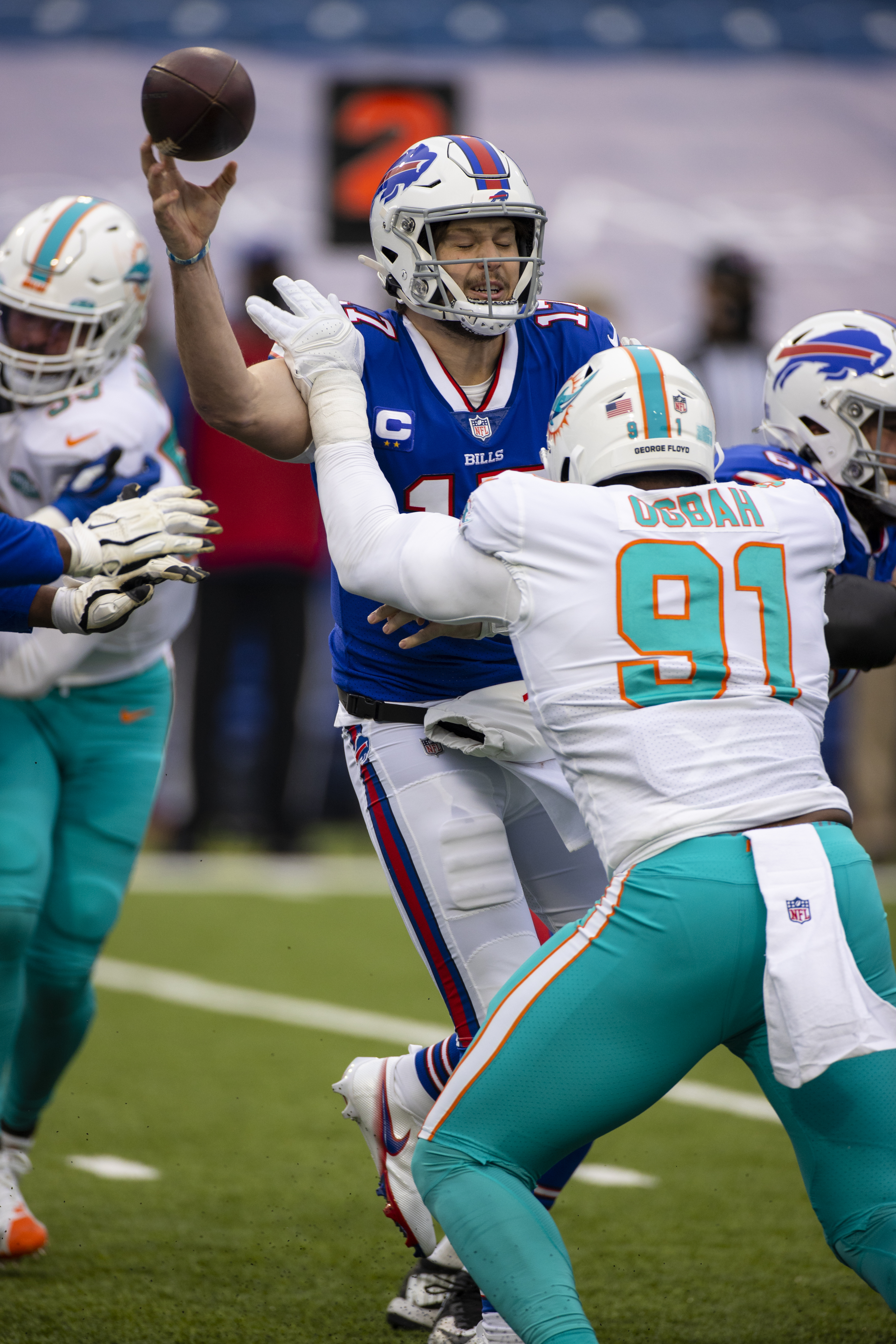 Miami Dolphins defensive end Emmanuel Ogbah (91) runs off the