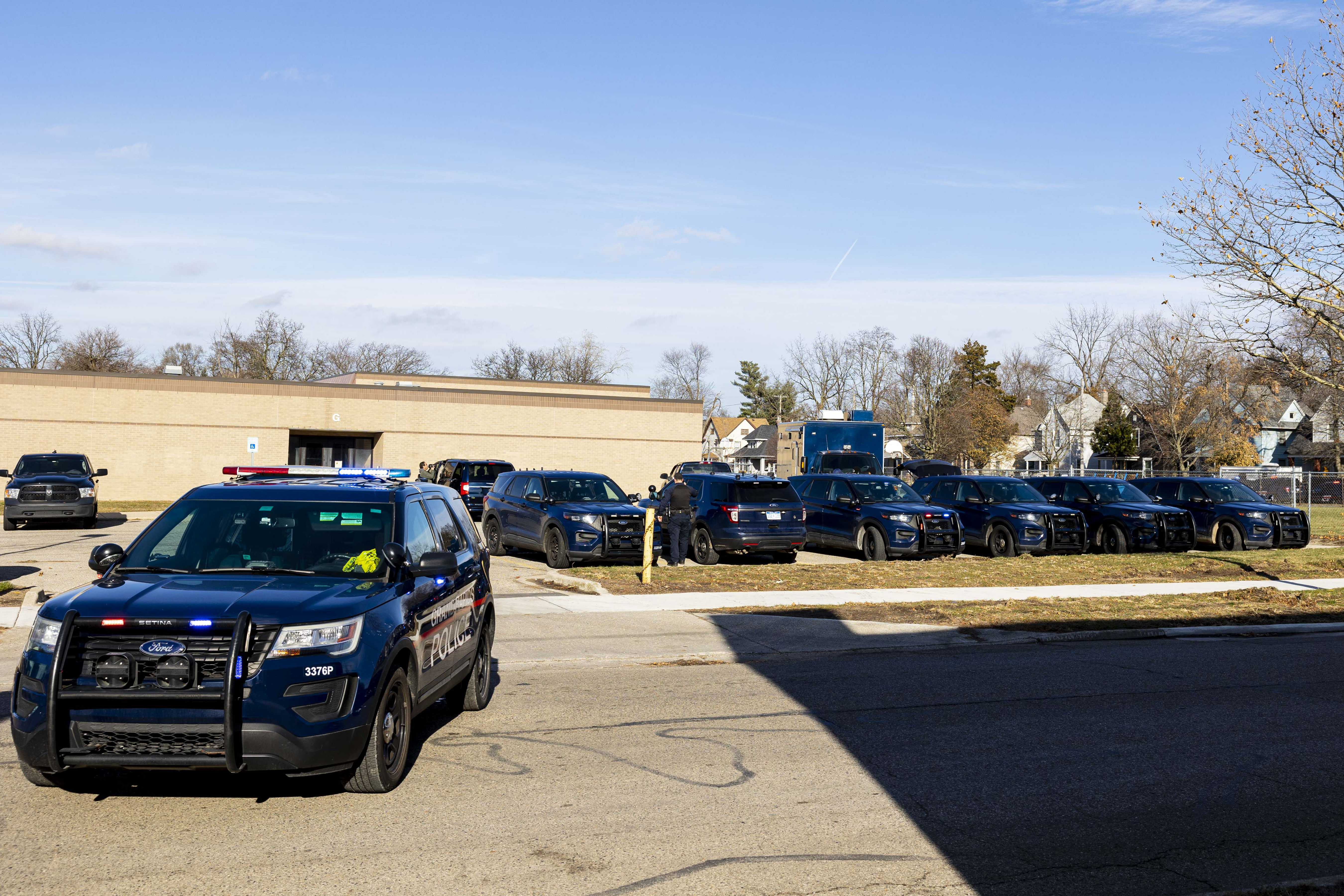 Homicide suspect dead after shootout with police in Grand Rapids ...