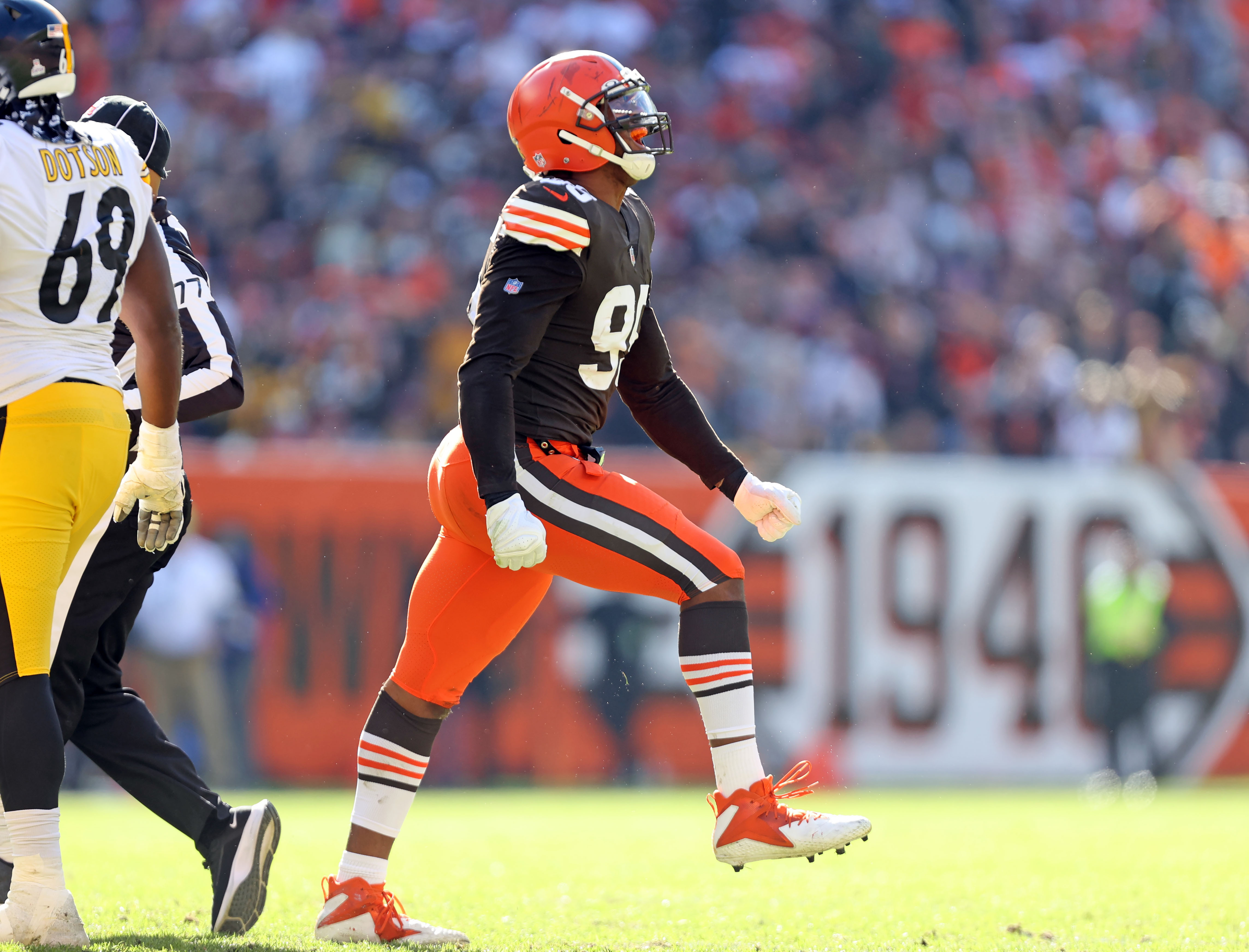 Cleveland Browns defensive end Myles Garrett (95) tackles Pittsburgh  Steelers running back Kalen Ballage (29) during