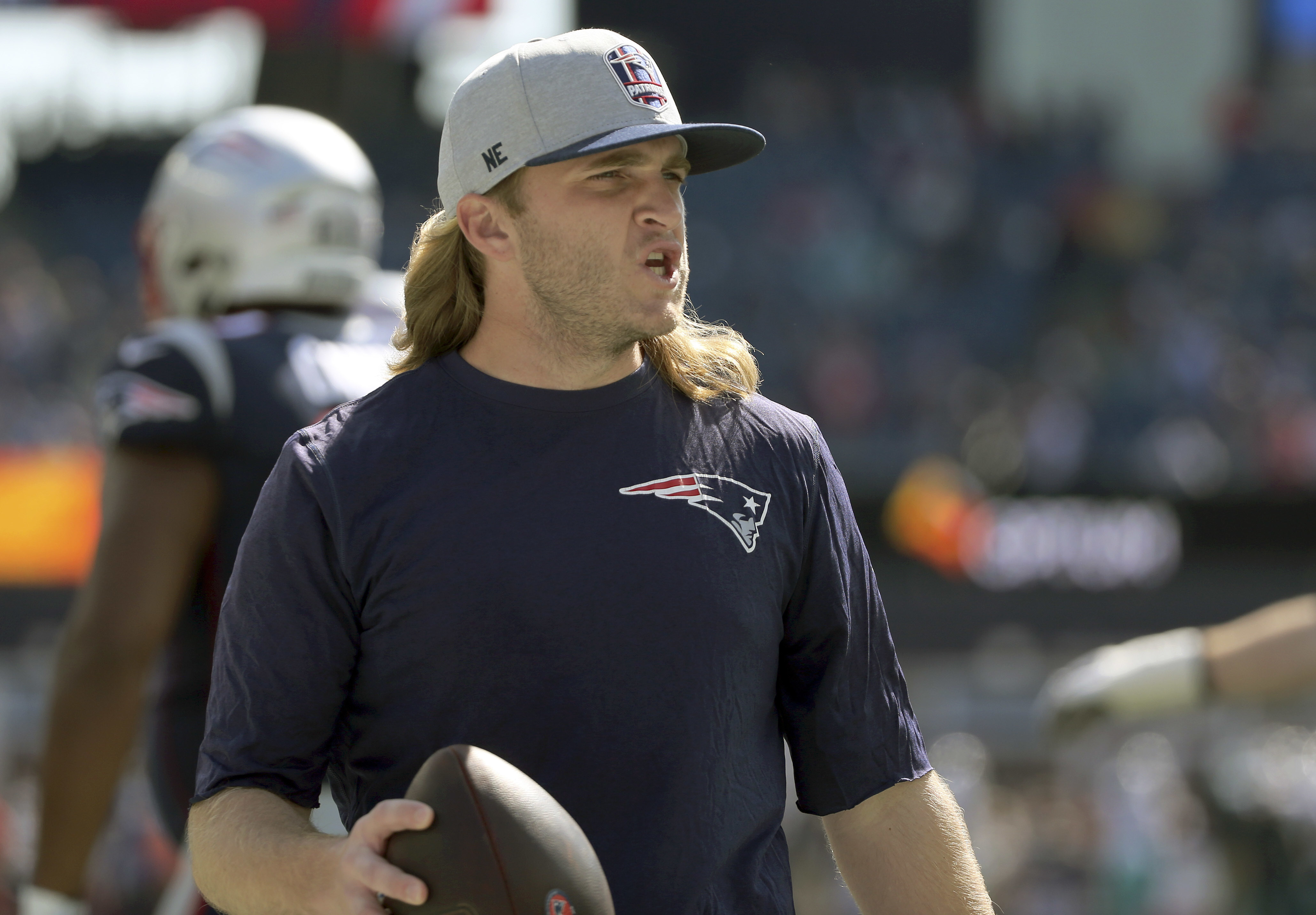 Patriots OLB coach Steve Belichick pumps up young pass rushers