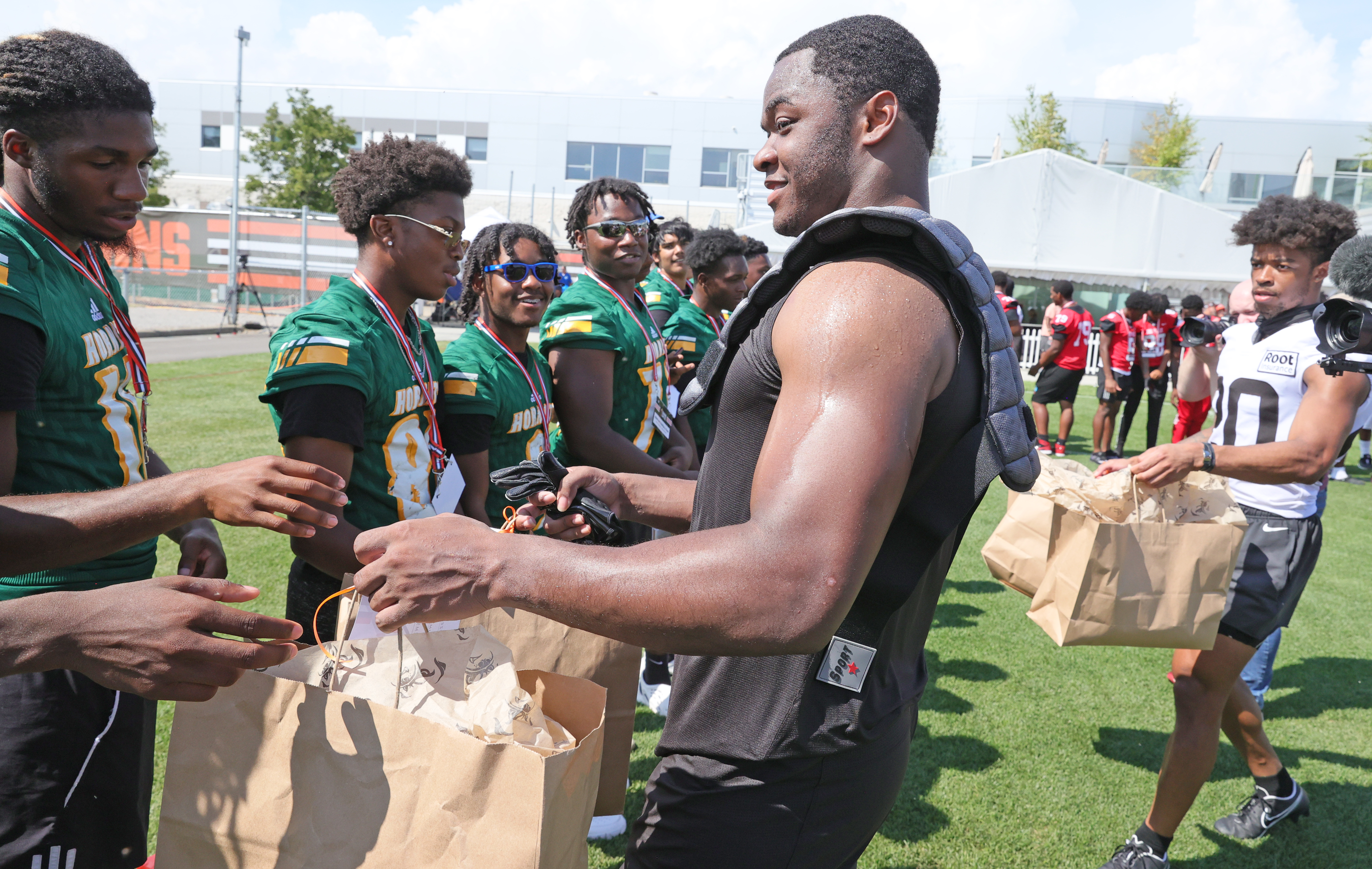 Browns players congratulate Glenville on state championship