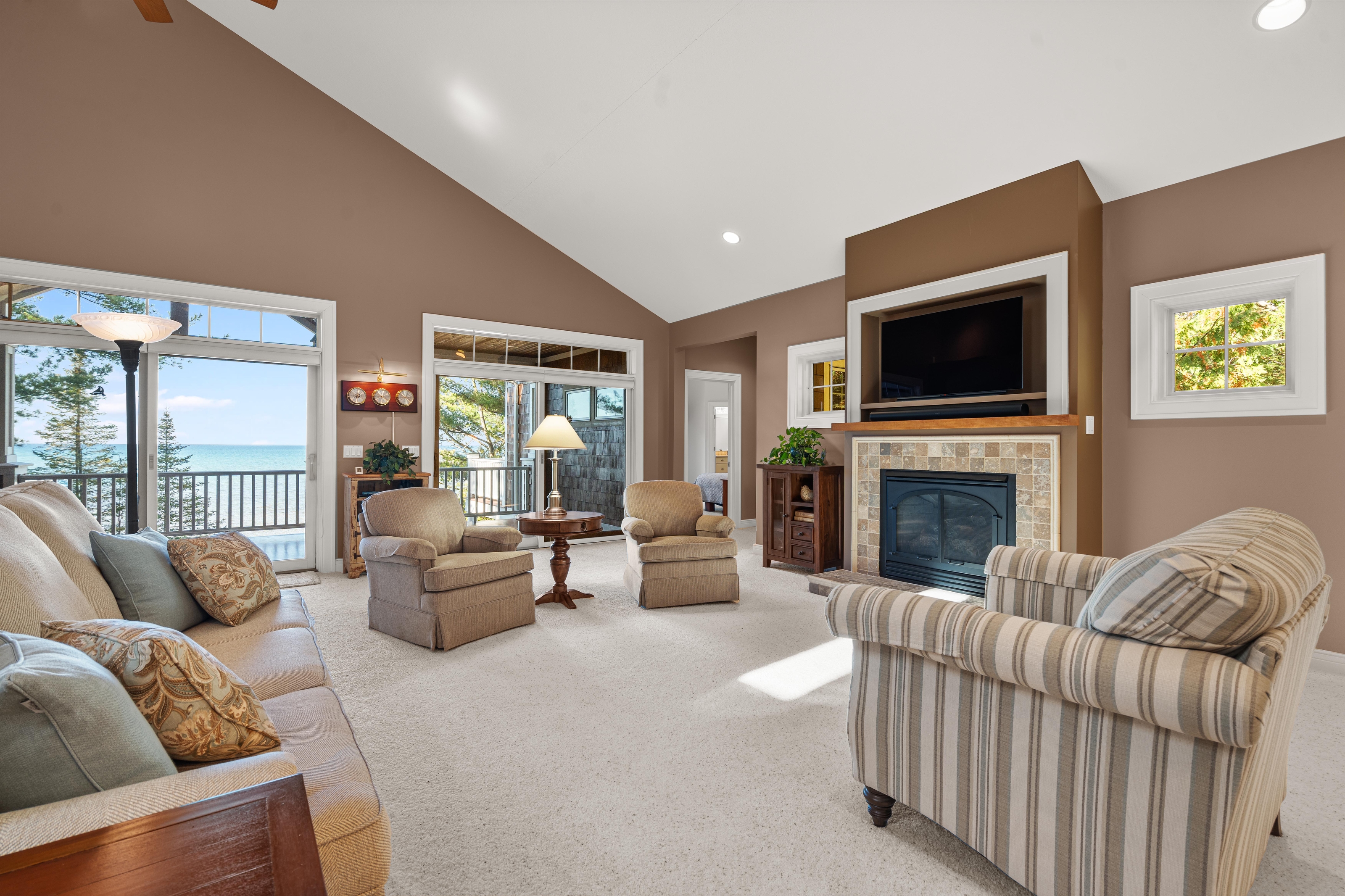 Interior photographs of 4093 Lake Shore Drive in Charlevoix, this gem is listed at $2,099,900 through Berkshire Hathaway HomeServices Michigan Real Estate – Traverse City and The Crane Group with associate broker Johnny Crane and his brother, co-listing agent Matt Crane.