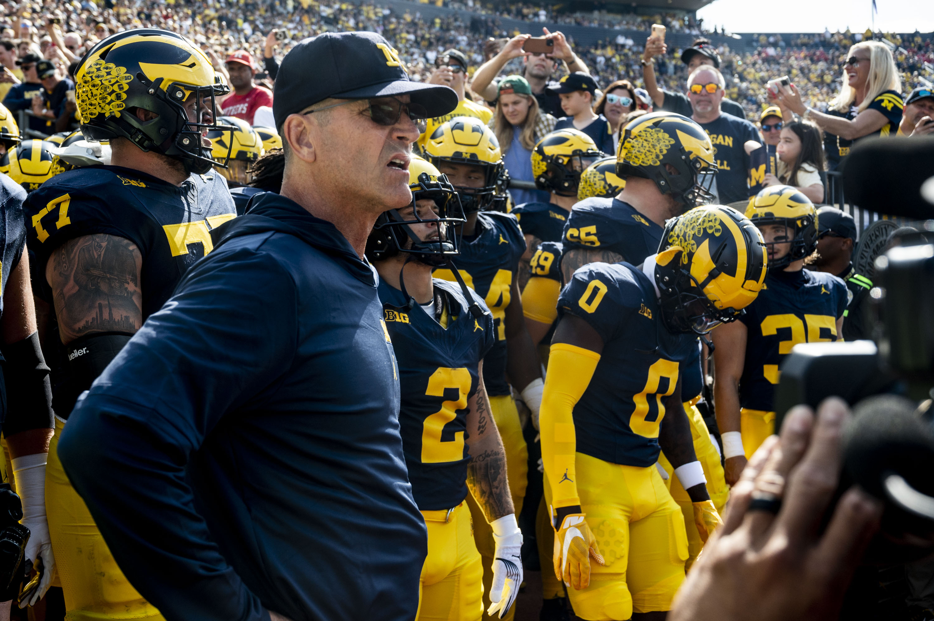 Michigan players marvel at Jim Harbaugh's defiance, change over last year - mlive.com