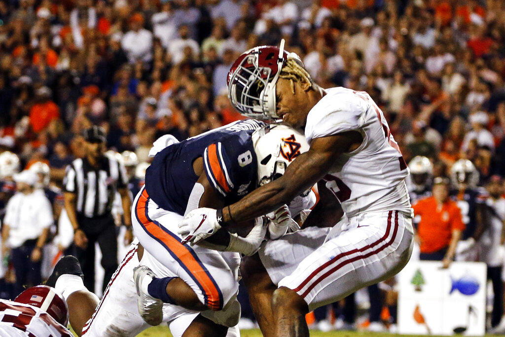 alabama football helmet knocked off auburn run Little man runs everybody over': Behind Shaun Shivers' decisive touchdown,  lasting Iron Bowl image