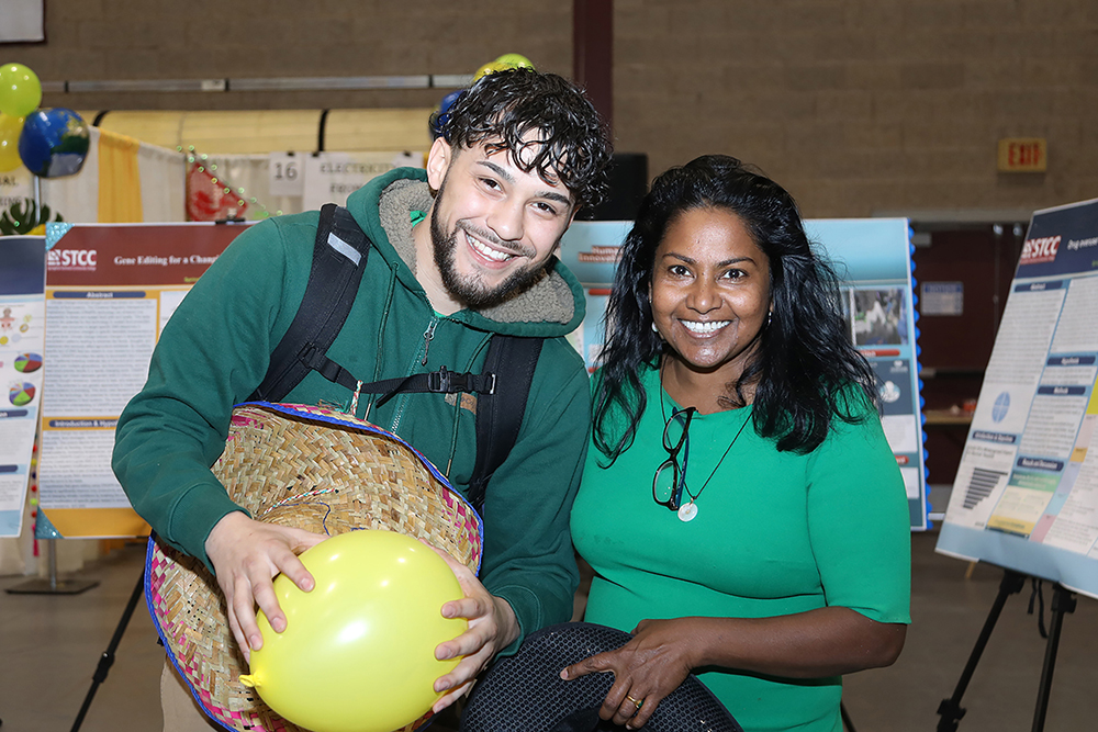 STCC Class President Guadalupe Torres and Professor Reena Randhir at the Sustainathon event taking place in the gym in building 2 at Springfield Technical Community College on April 11