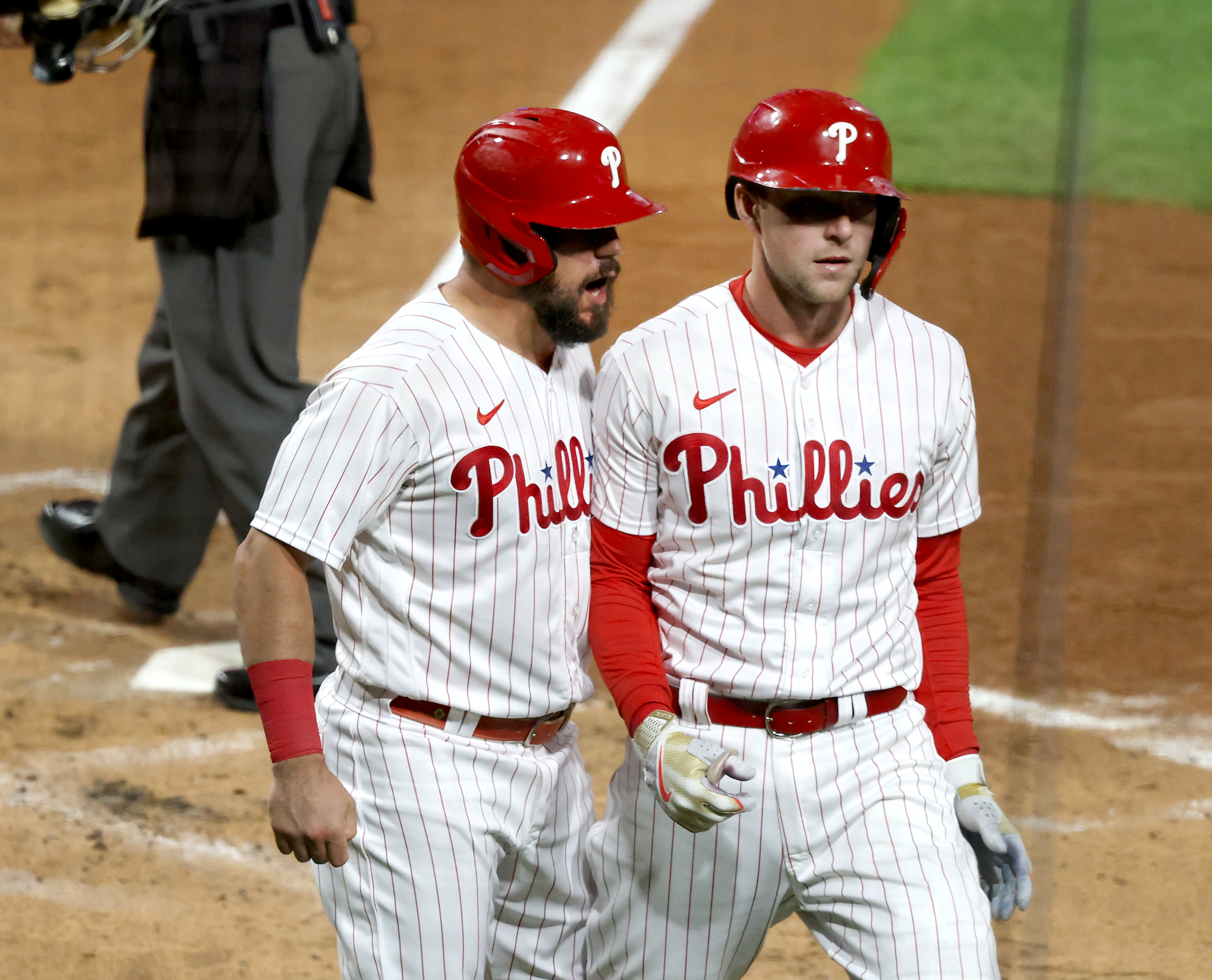 Philadelphia Phillies' Bryson Stott, right, is congratulated by Jean Segura  after hitting a home run against the San Francisco Giants during the fourth  inning of a baseball game in San Francisco, Saturday