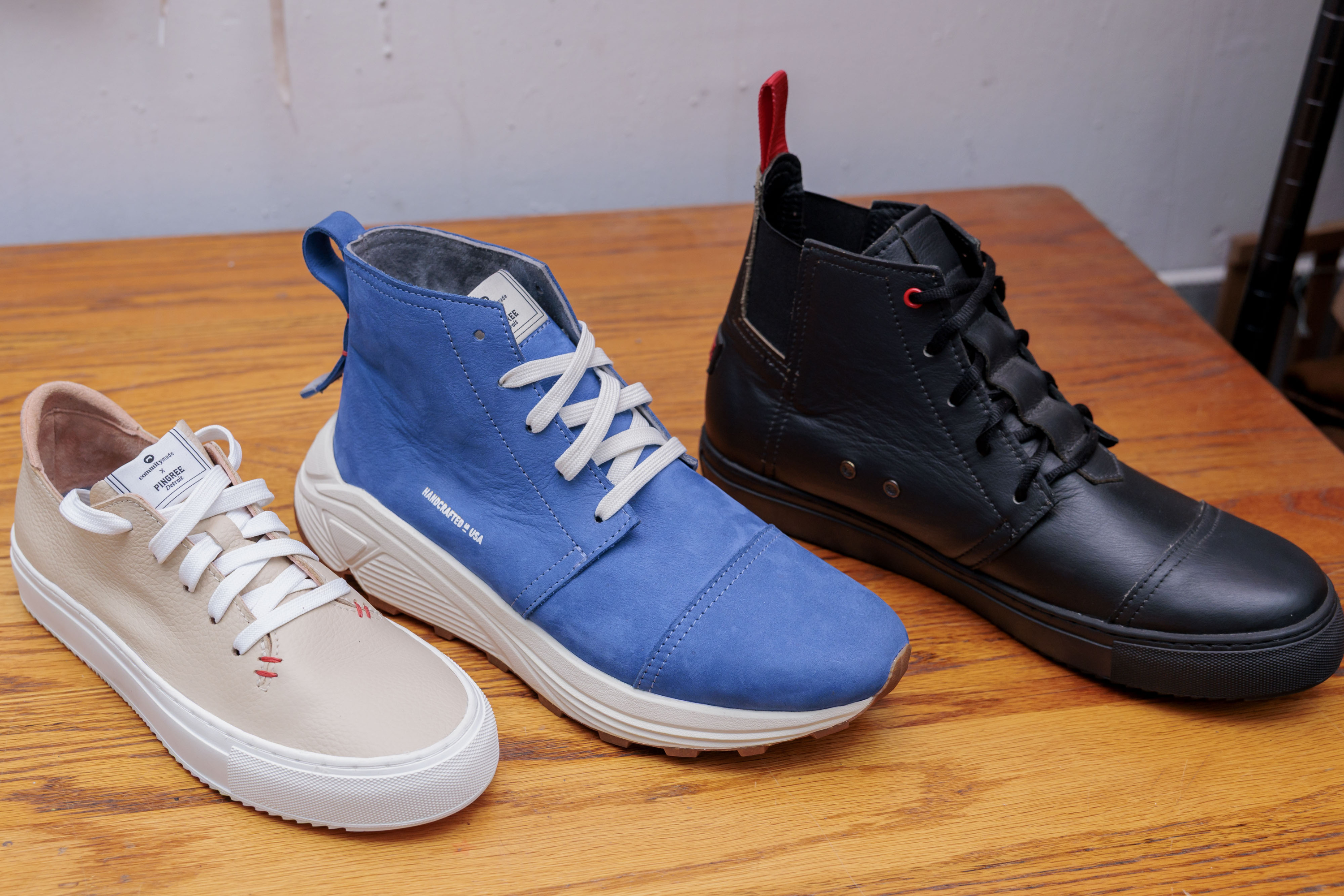 Handmade shoes - from left, the “Eastsider” low top, “Strider” chukka boot and “The Mayor” high-top sneakers - at Pingree Detroit, 15707 Livernois in Detroit on Monday, Oct. 6 2025.