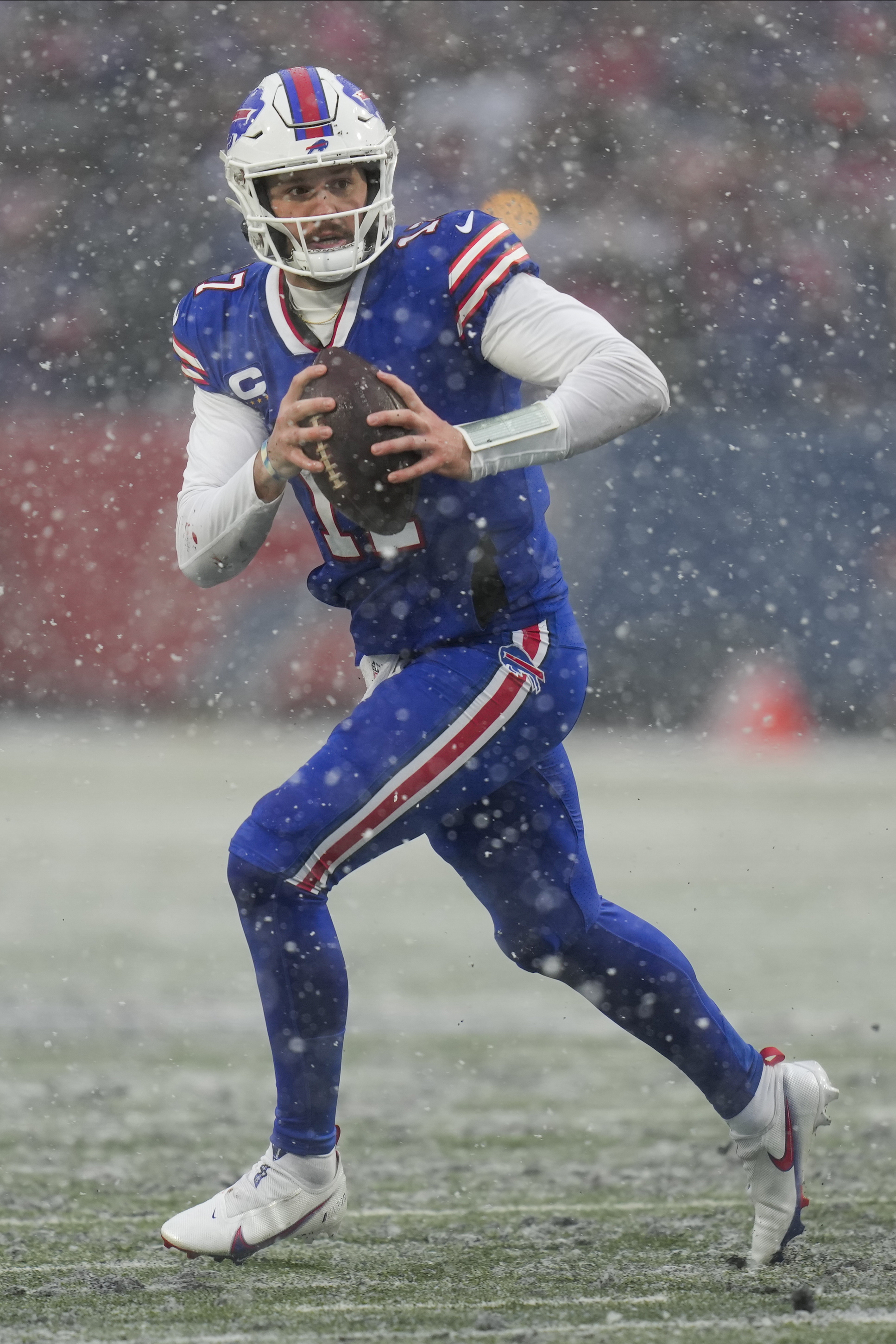 Buffalo Bills fans watch players warm up before an NFL division round  football game between the Buffalo Bills and the Cincinnati Bengals, Sunday,  Jan. 22, 2023, in Orchard Park, N.Y. (AP Photo/Seth