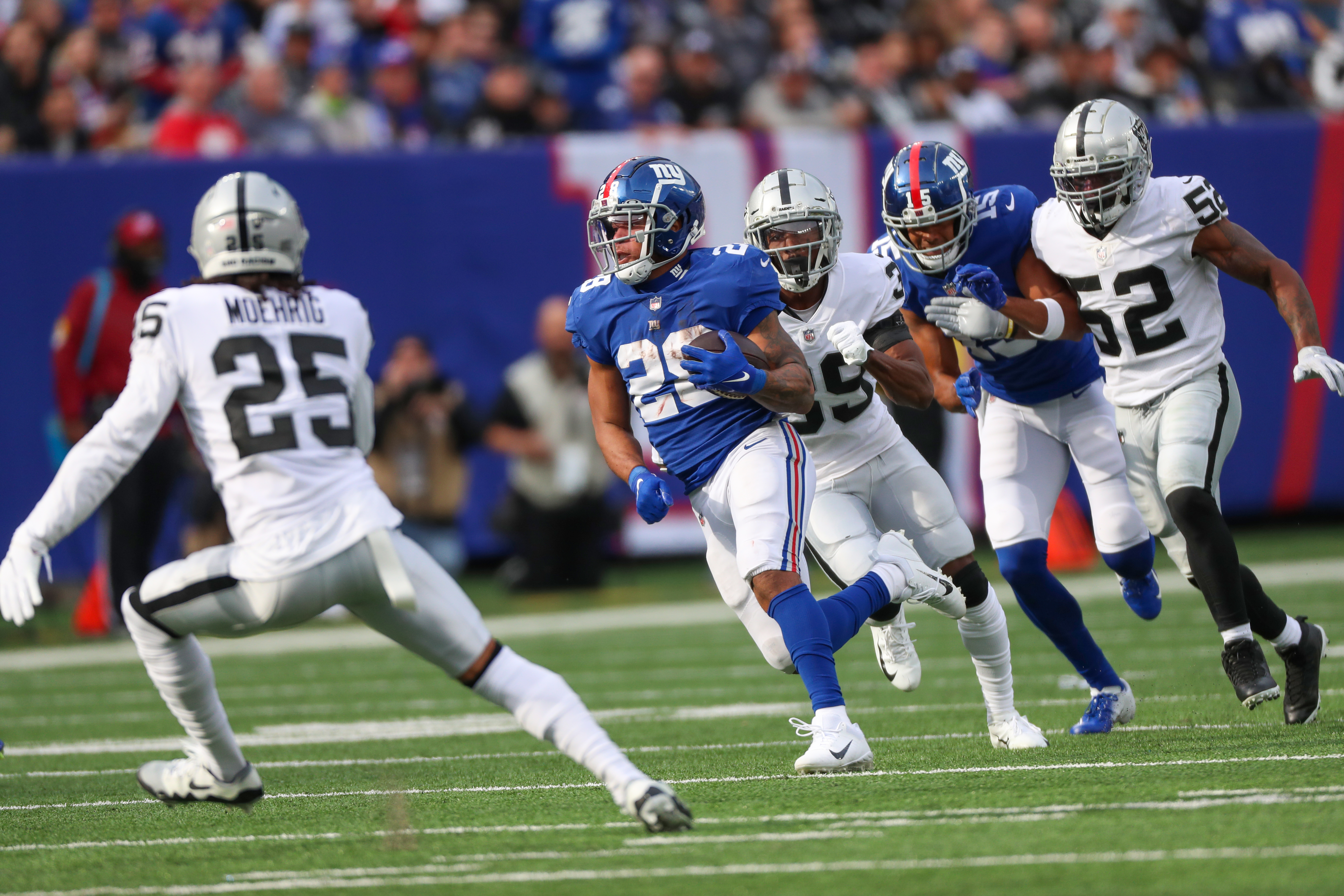 McKinney has 2 picks, Giants edge Raiders 23-16