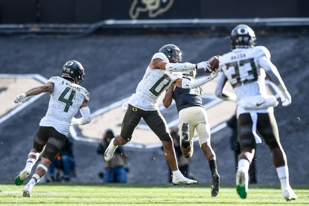 Watch: Former Oregon Ducks star Christian Gonzalez gets his first NFL  interception for the New England Patriots 