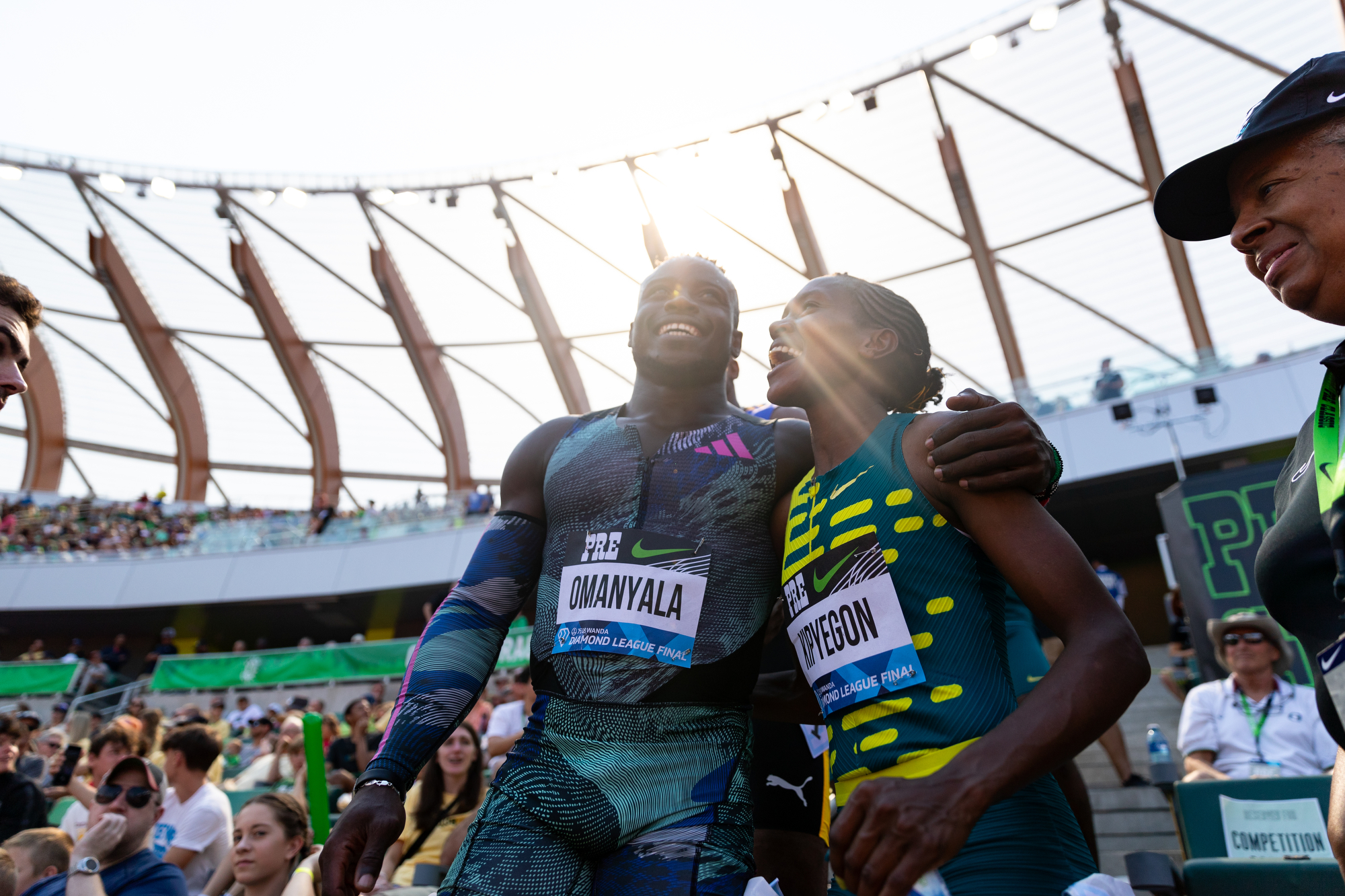 Kenyans Ferdinand Omanyala (left) and Faith Kipyegon celebrate together at the Prefontaine Classic track and field meet on Saturday, Sept. 16, 2023, at Hayward Field in Eugene. Omanyala placed third in the men’s 100 meters, and Kipyegon won the women’s 1,500.