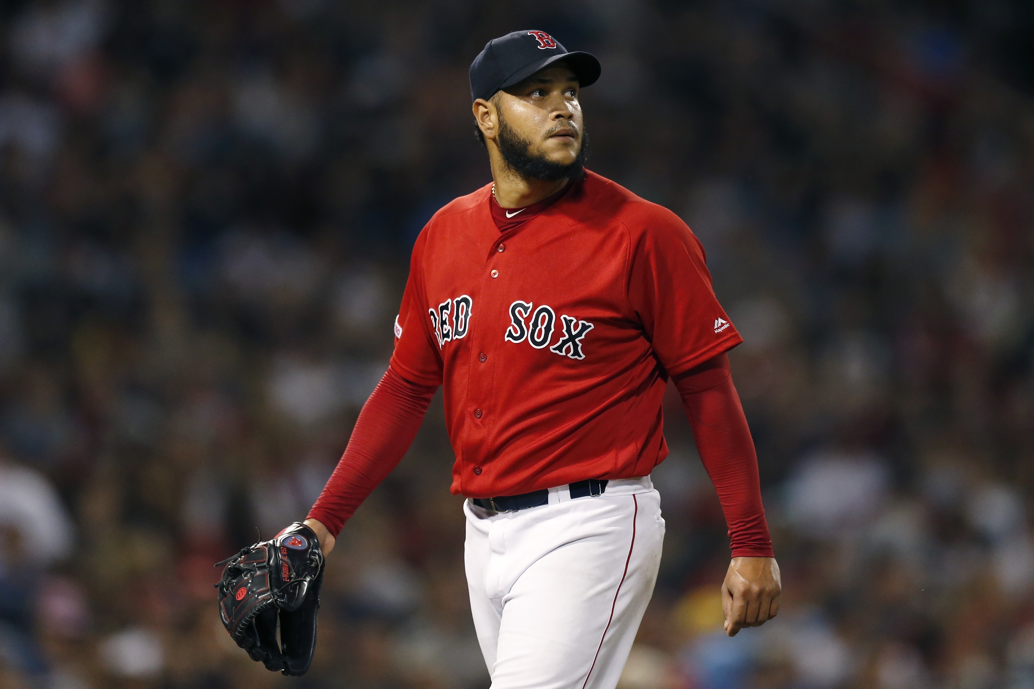 Boston Red Sox's Kevin Pillar in cactus face mask, Mitch Moreland  camouflage as players arrive for coronavirus testing at Fenway Park 