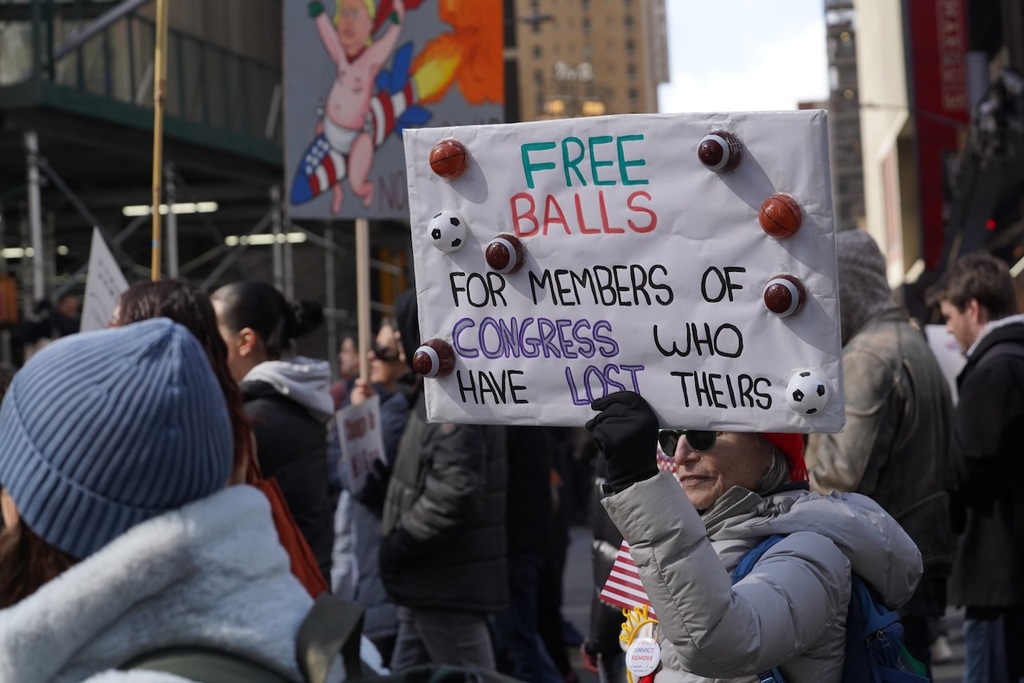 Photos: Tens of thousands march through Times Square in ‘No Kings ...