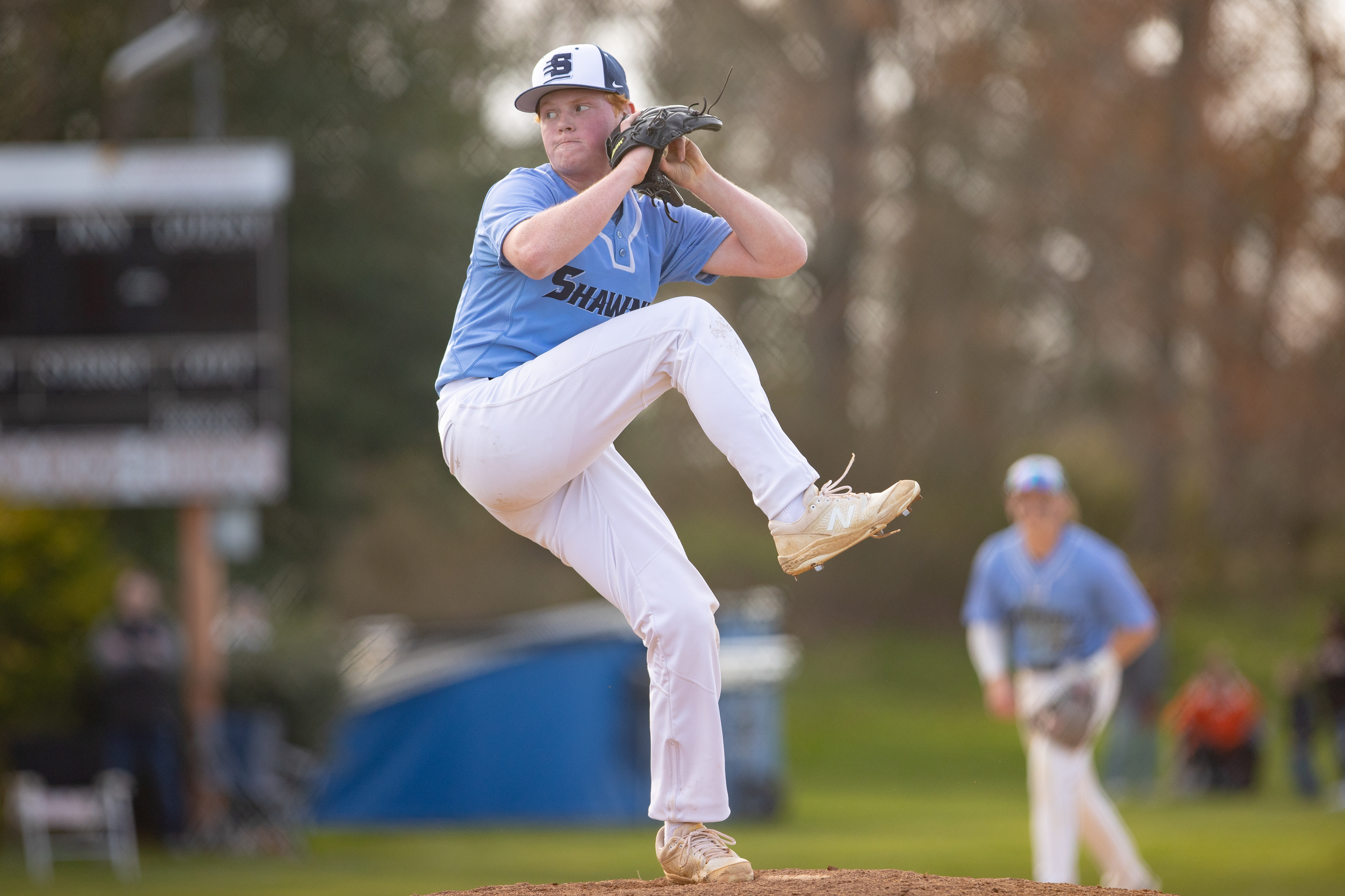 James Vlastaris (11) of Shawnee, winds up to pitch in Marlton, NJ on Monday, April 3, 2023.