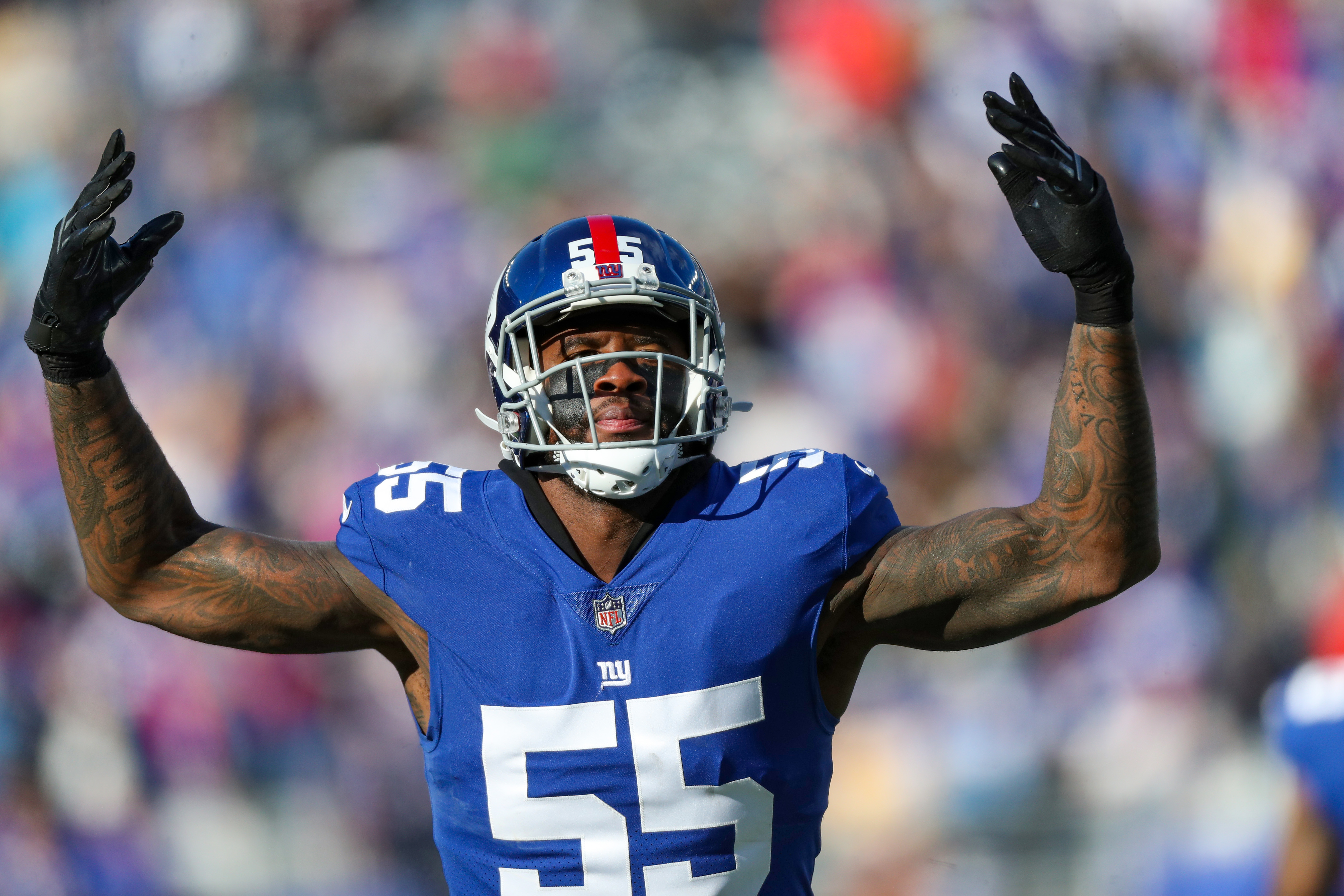 New York Giants linebacker Jihad Ward (55) stands on the sideline