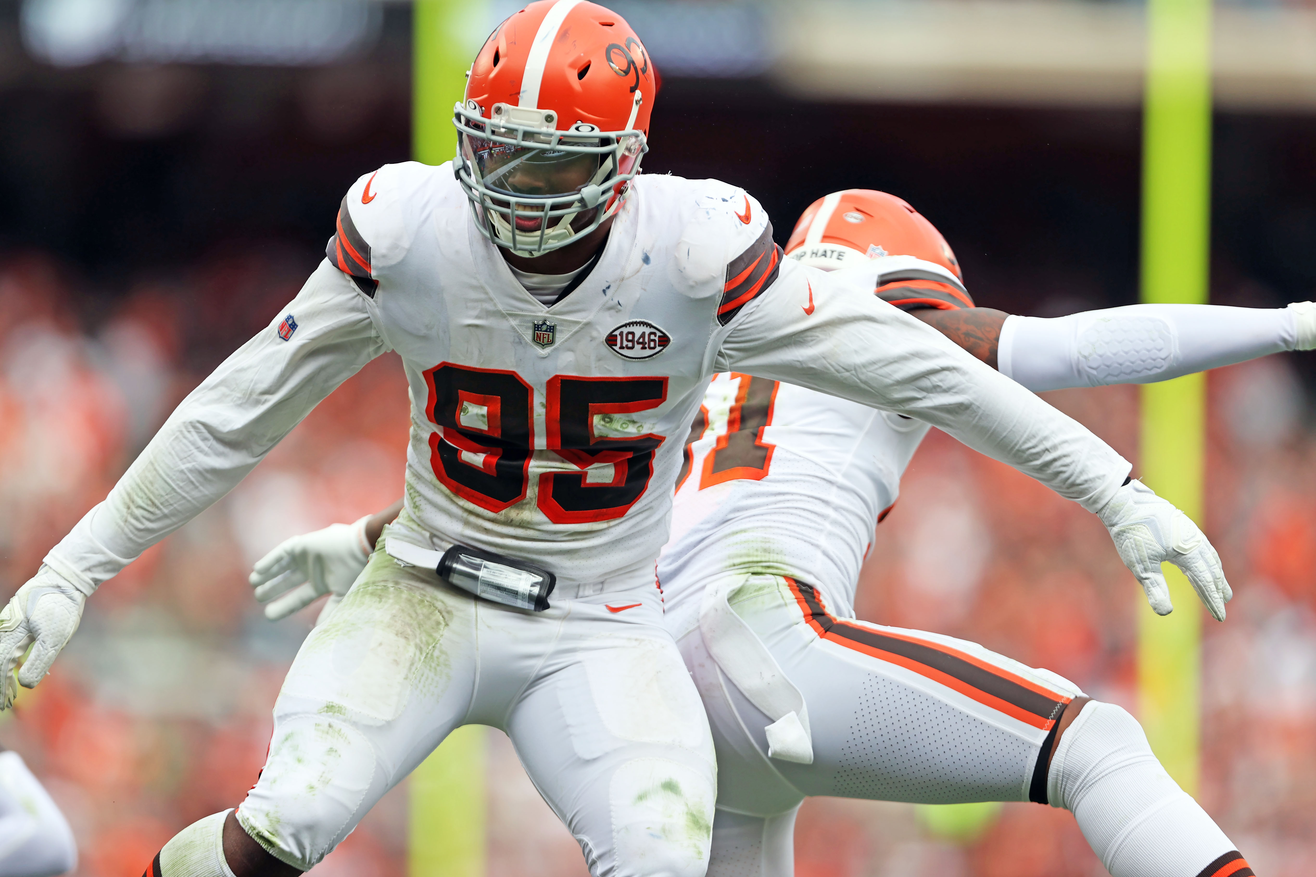 Myles Garrett Cleveland Browns Unsigned Celebrates A Sack in White Jersey Photograph