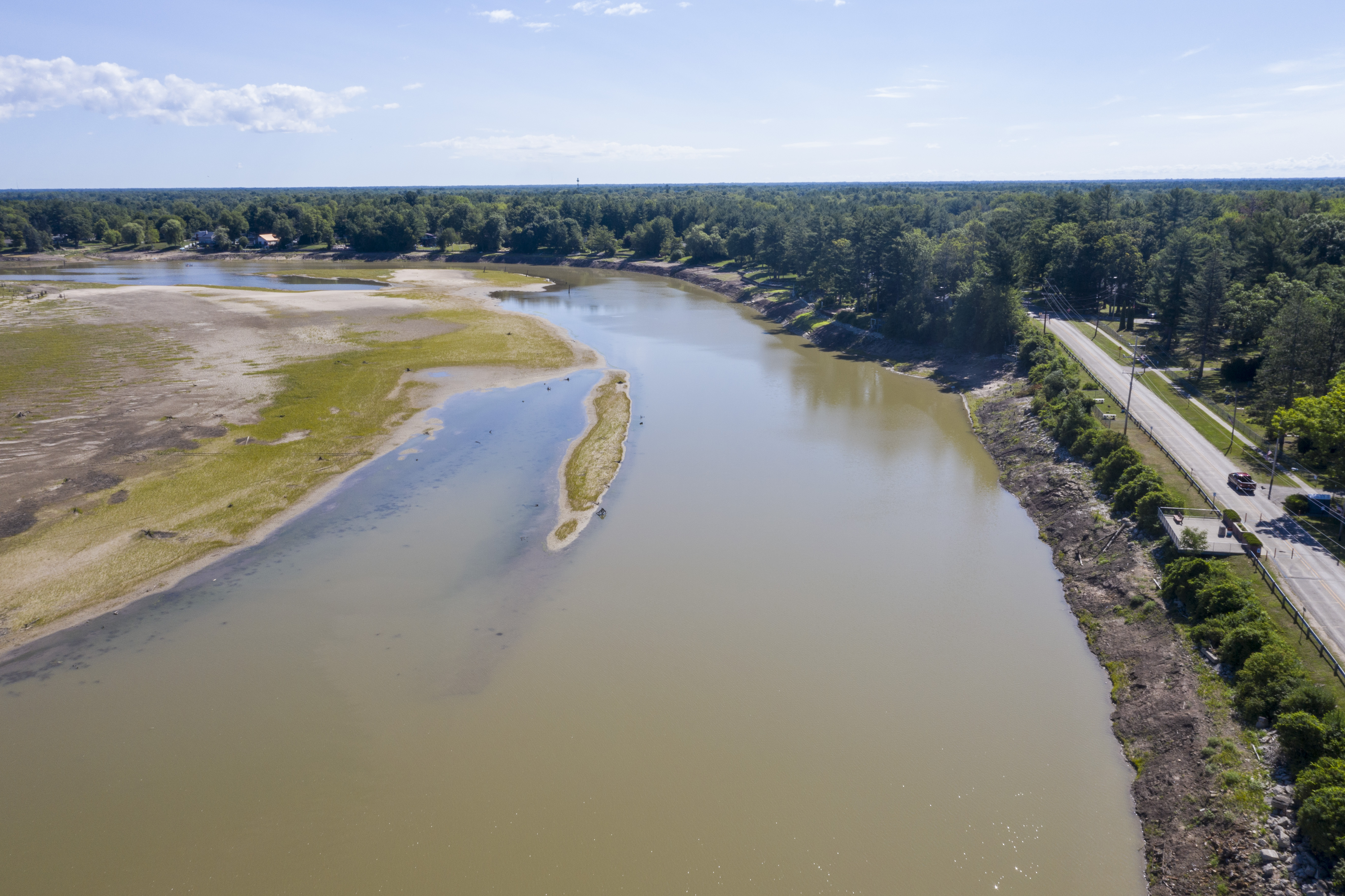 A view of what's left of Sanford Lake in Sanford on Thursday, July 30, 2020. The devastating flood in May due to the failure of the Edenville and Sanford Dam left Wixom and Sanford Lake nearly empty. (Kaytie Boomer | MLive.com)