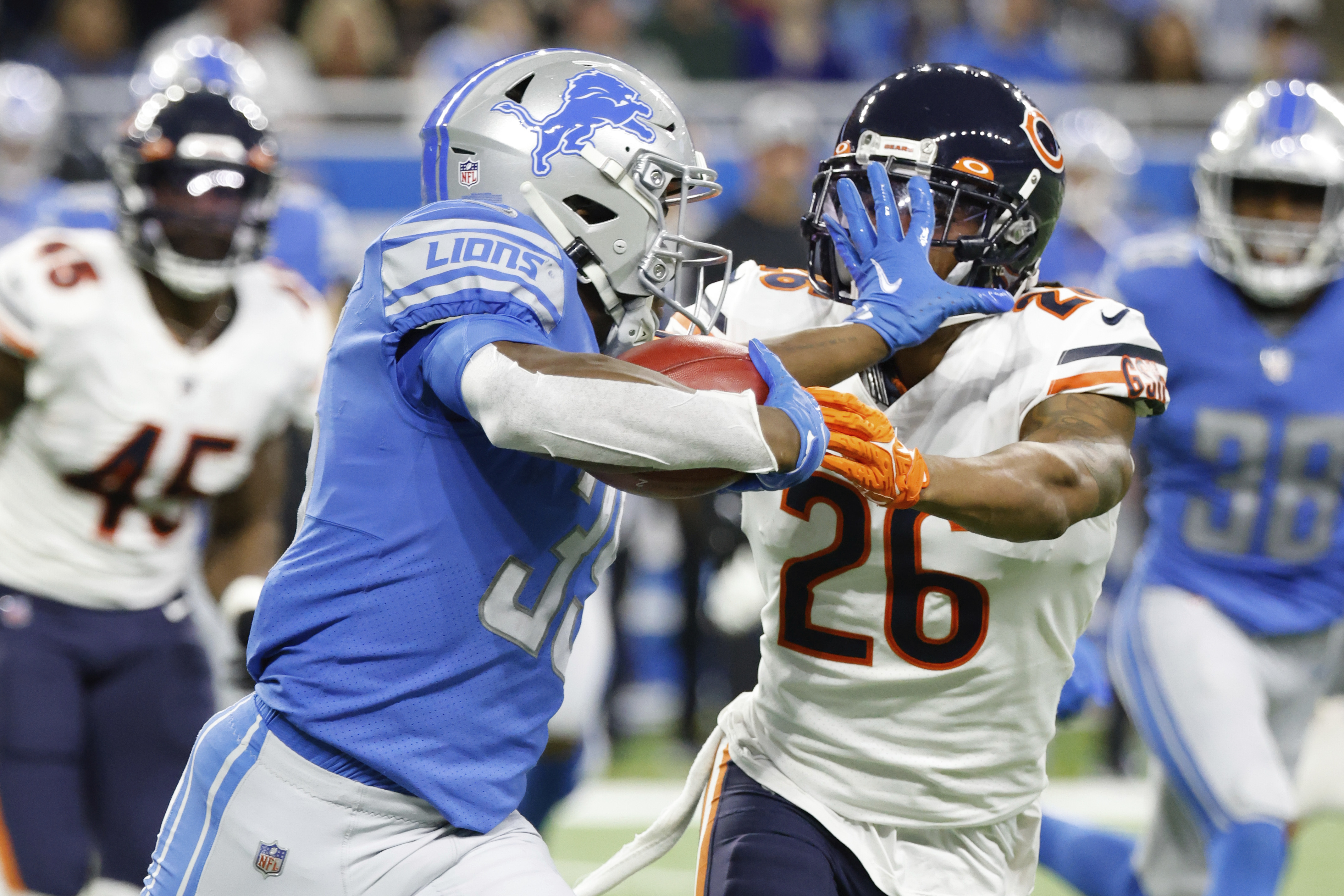 Detroit Lions running back Godwin Igwebuike (35) is tackled during the  first half of an NFL foo …