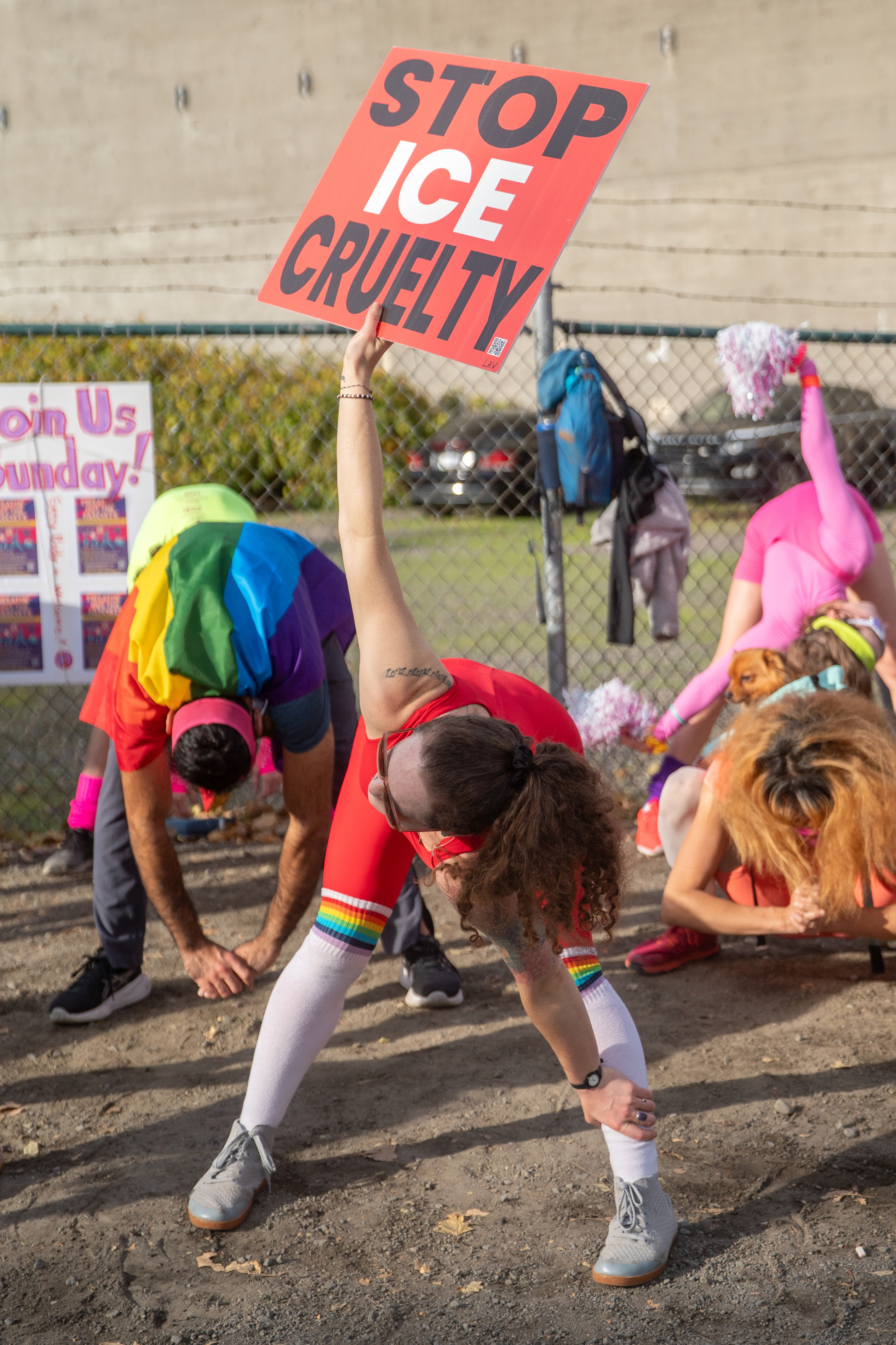 Participants in Fulcrum Fitness’s “Sweatin’ Out the Fascists” held an ’80s-aerobics peaceful protest outside the U.S. Immigration and Customs Enforcement (ICE) facility in South Portland on Sunday, Nov. 9, 2025, collecting donations for the Oregon Food Bank.