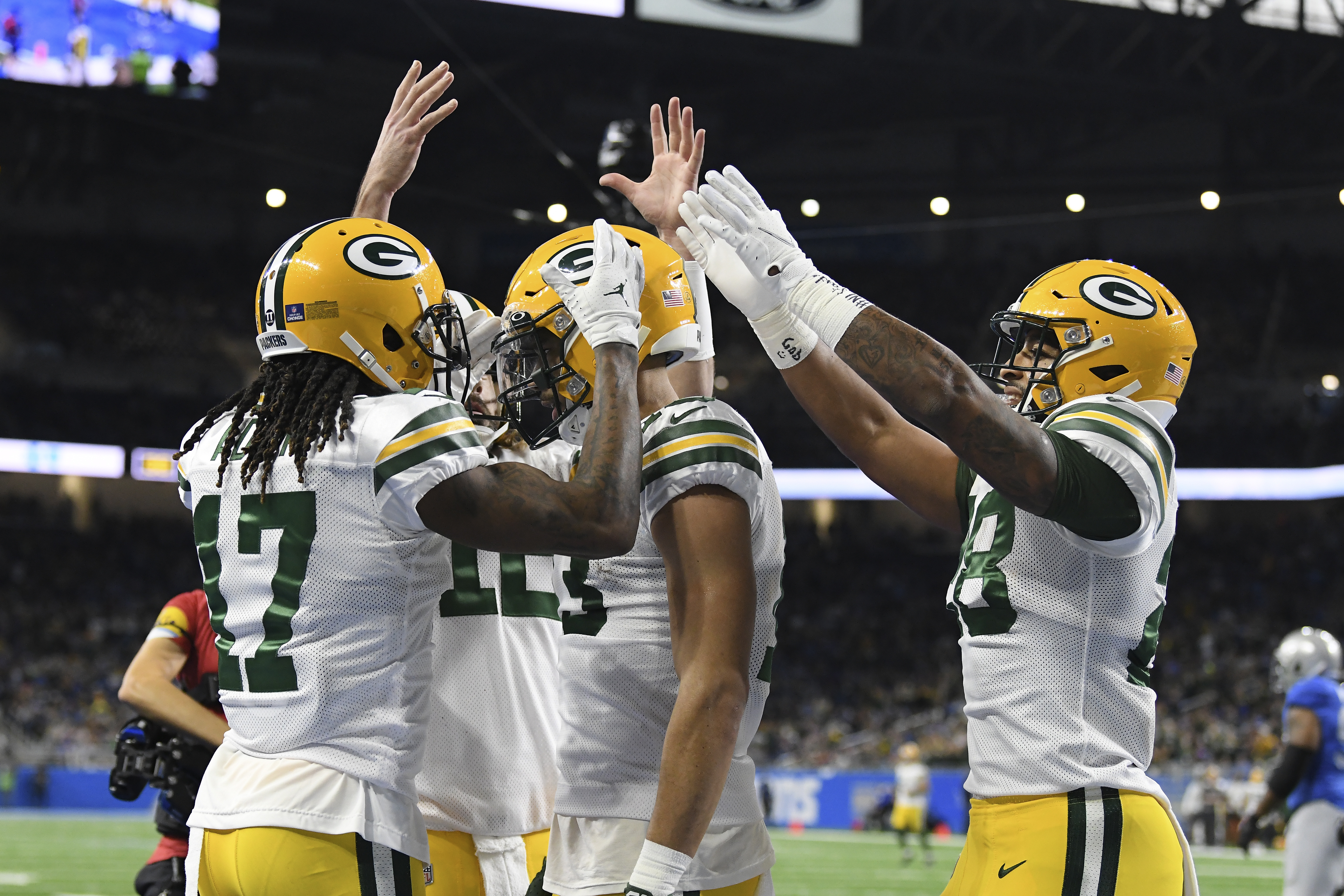 Packers fan caught by  TV cameras showering Lions star Amon-Ra St.  Brown with beer while he celebrated touchdown