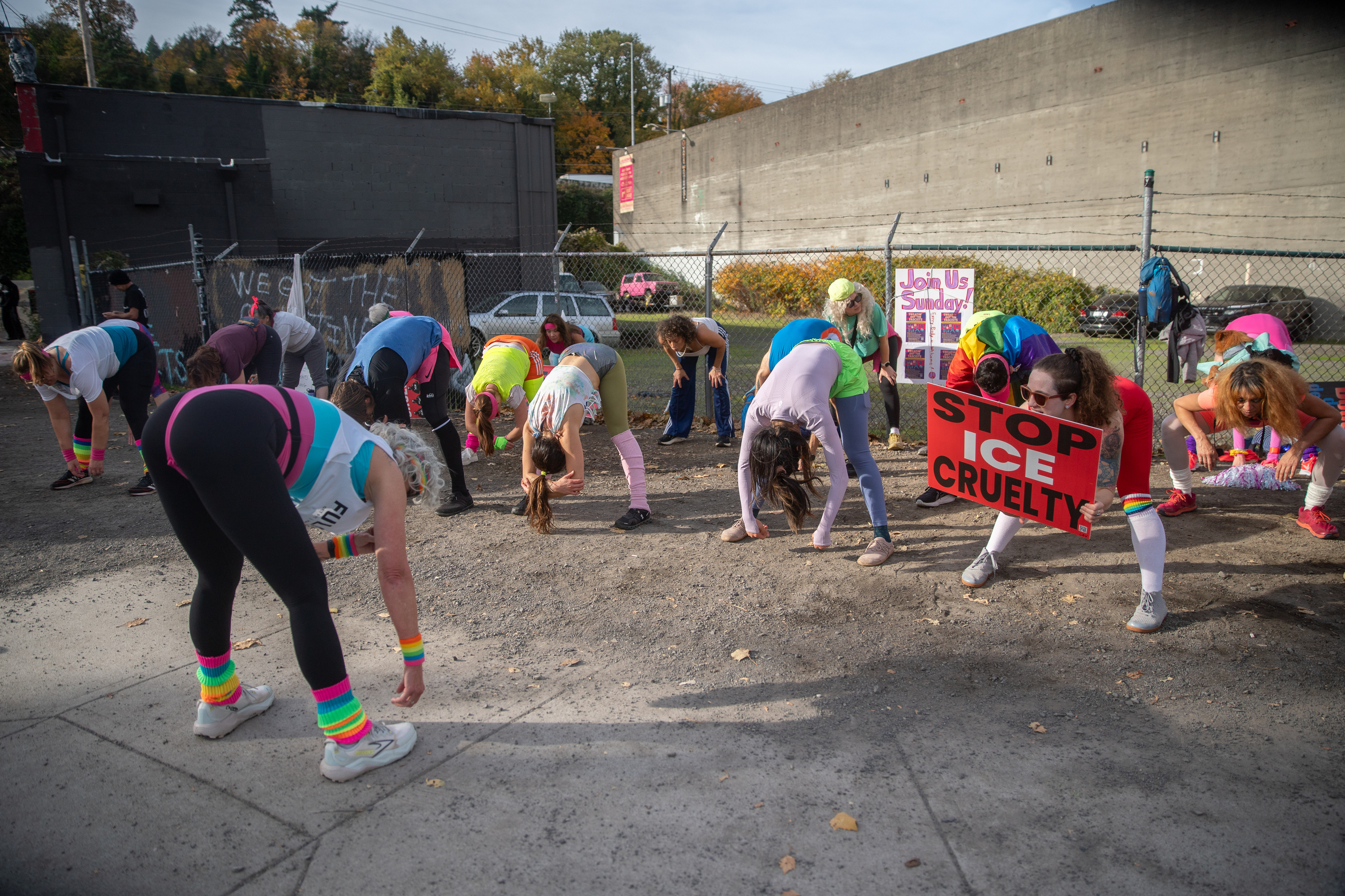Participants in Fulcrum Fitness’s “Sweatin’ Out the Fascists” held an ’80s-aerobics peaceful protest outside the U.S. Immigration and Customs Enforcement (ICE) facility in South Portland on Sunday, Nov. 9, 2025, collecting donations for the Oregon Food Bank.