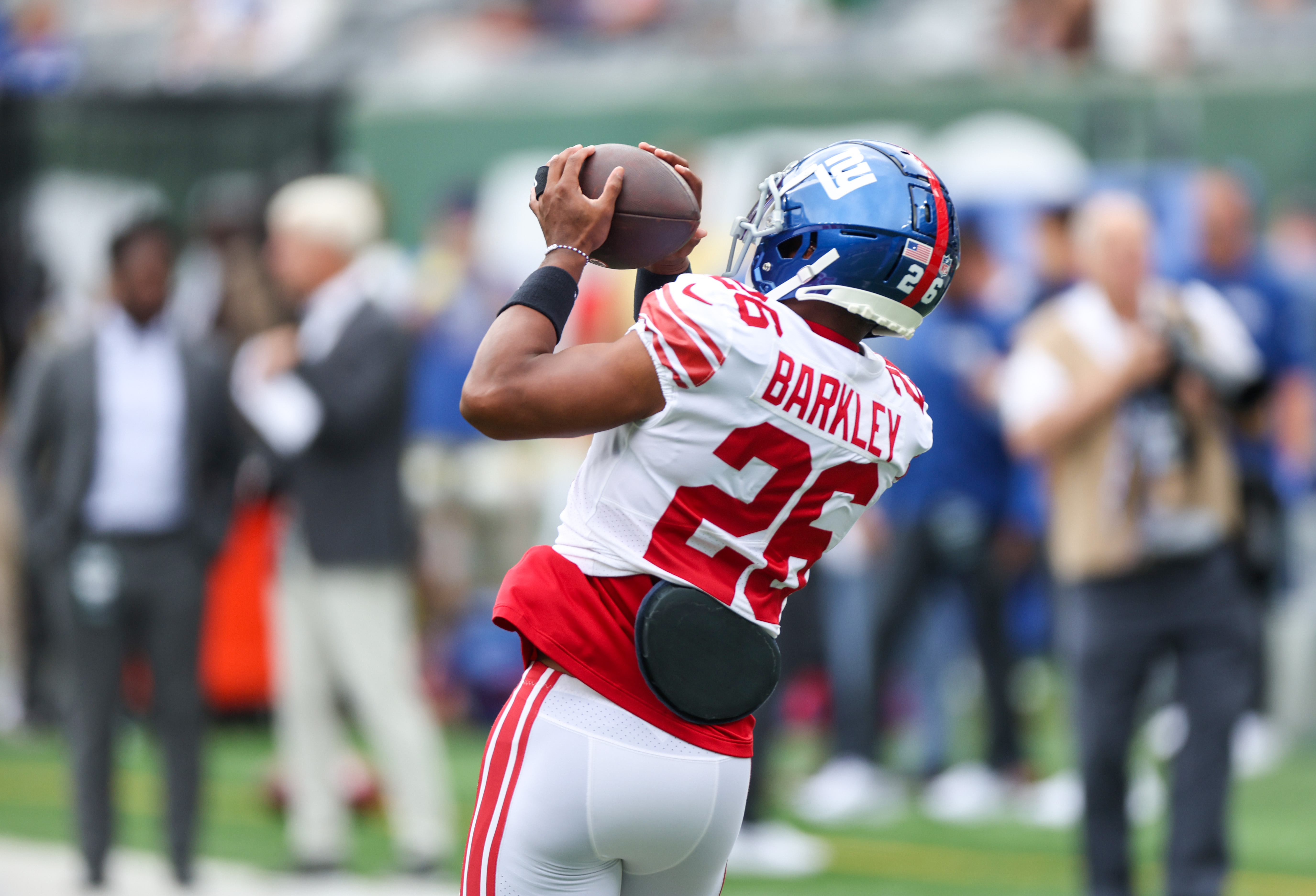 New York Giants' Saquon Barkley talks on this phone after an NFL football  game against the Carolina Panthers, Sunday, Sept. 18, 2022, in East  Rutherford, N.J. (AP Photo/Noah K. Murray Stock Photo 