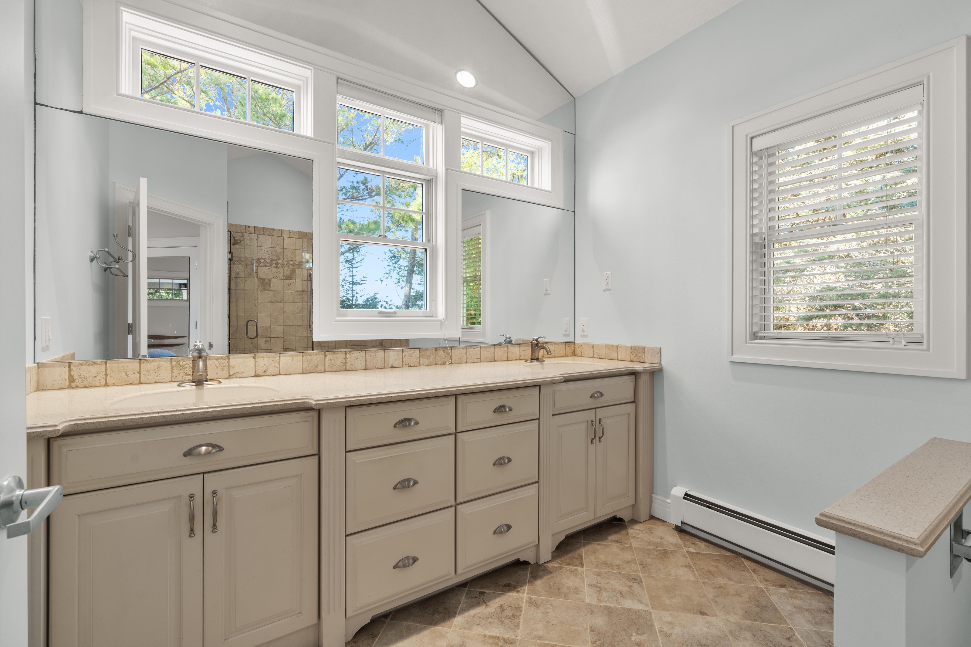 Interior photographs of 4093 Lake Shore Drive in Charlevoix, this gem is listed at $2,099,900 through Berkshire Hathaway HomeServices Michigan Real Estate – Traverse City and The Crane Group with associate broker Johnny Crane and his brother, co-listing agent Matt Crane.