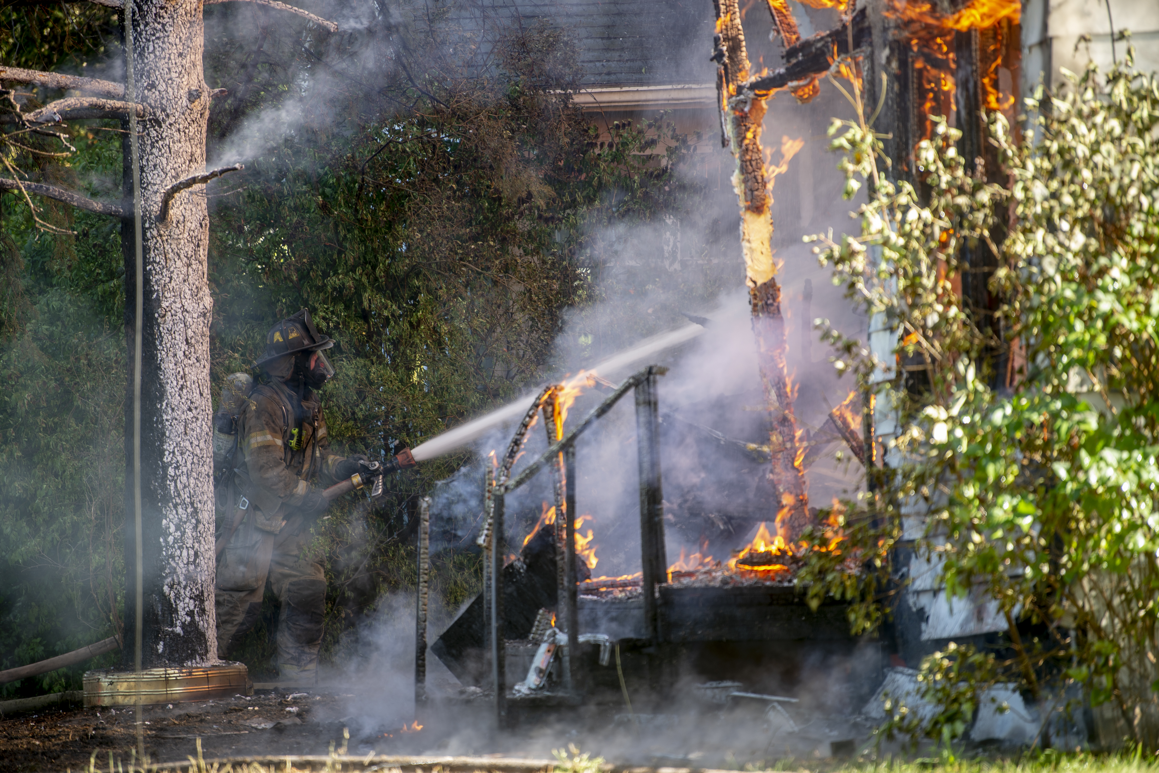 Firefighters battle fully-engulfed house fire in Flint - mlive.com
