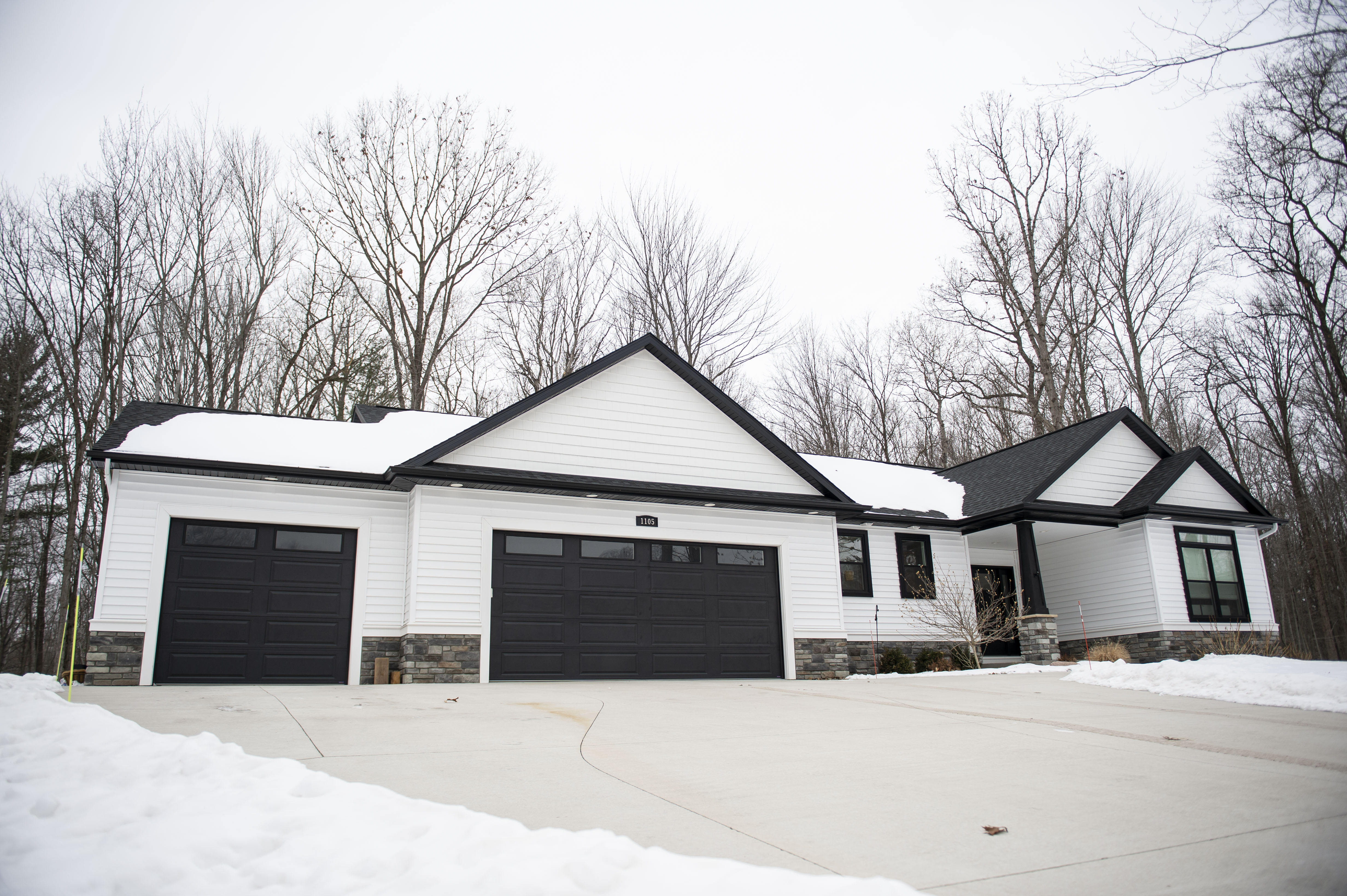 See inside modern split ranch-style home surrounded by woods, Pine ...