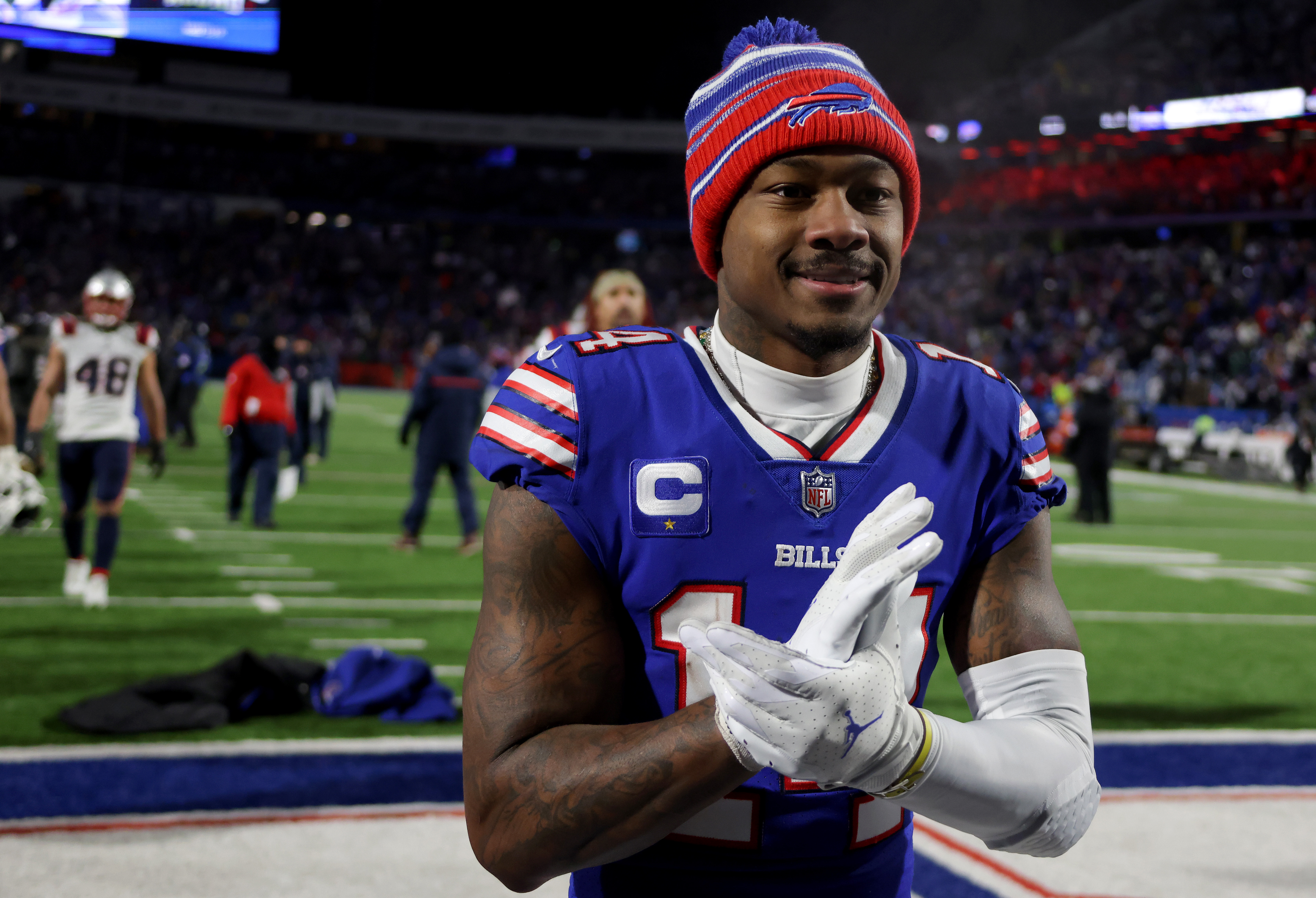 Buffalo Bills wide receiver Stefon Diggs (14) runs off the field after an NFL  football game against the Green Bay Packers, Sunday, Oct. 30, 2022, in  Orchard Park, N.Y. (AP Photo/Bryan Bennett