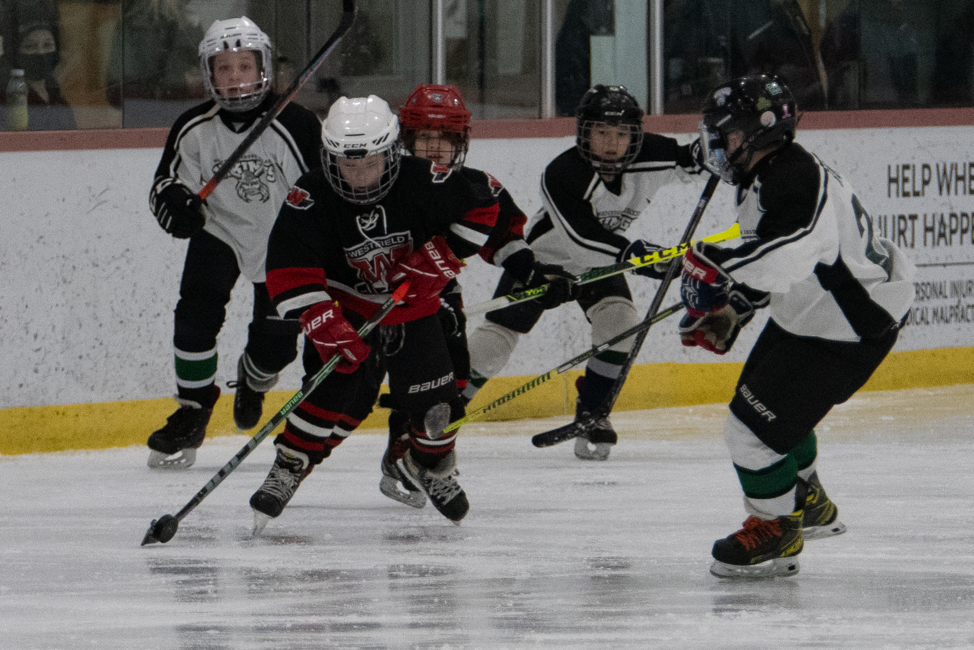 The Westfield Junior Bombers Red battle the Northern Rhode Island Vikings in a Westfield Youth Hockey Fire & Ice Tournament game Sunday at Amelia Park Arena. The game ended in a 2-2 tie. (Bill Deren / The Westfield News)