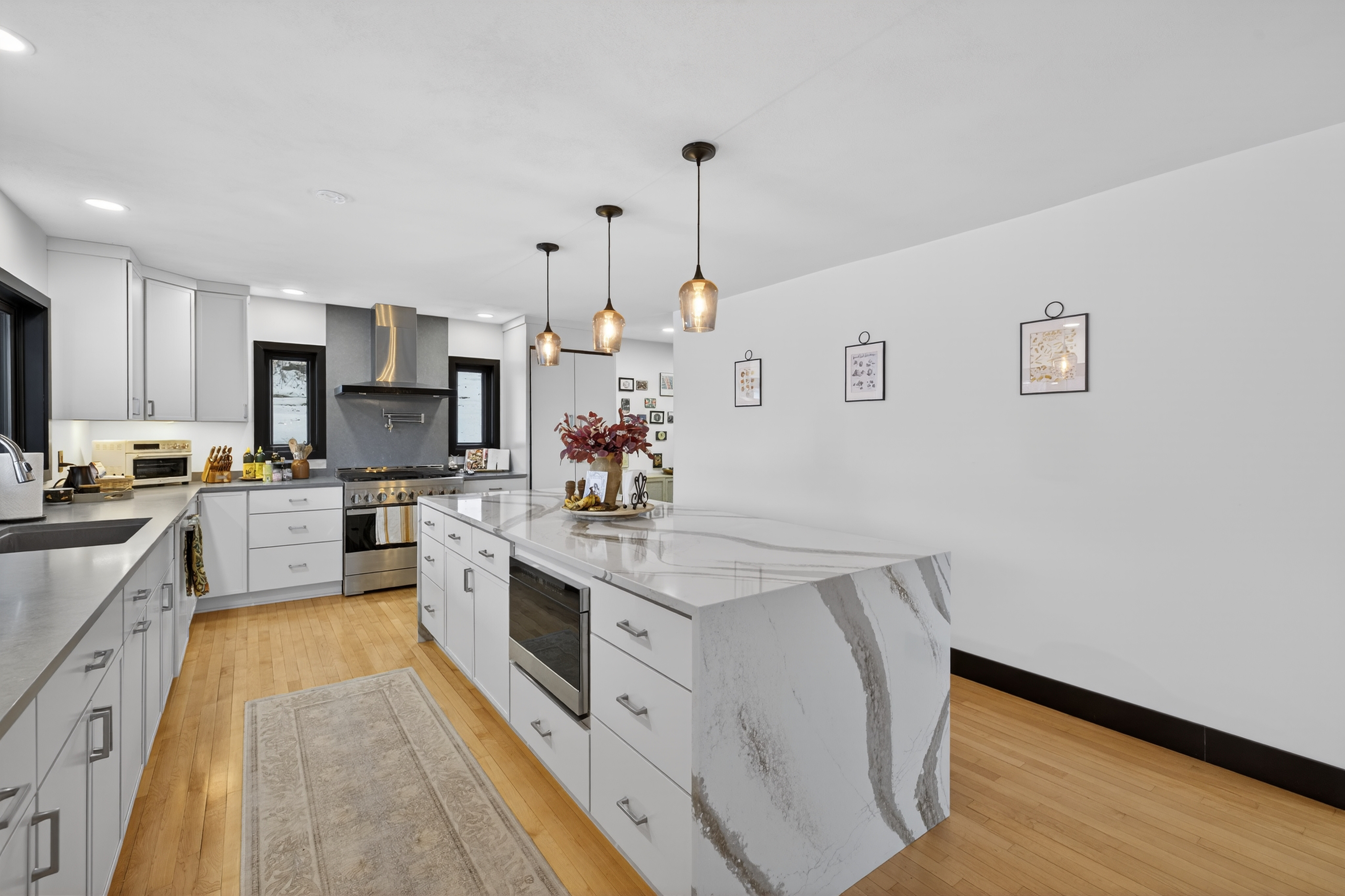 - Christina Cianciosi grew up admiring the house at 101 Alton Street in Syracuse which borders Bellevue Country Club. In 2022, she bought the unique home and gave it an extensive renovation. The island has a drawer microwave. Courtesy of Kyle Fedrizzi, owner of kfotography315, LLC.