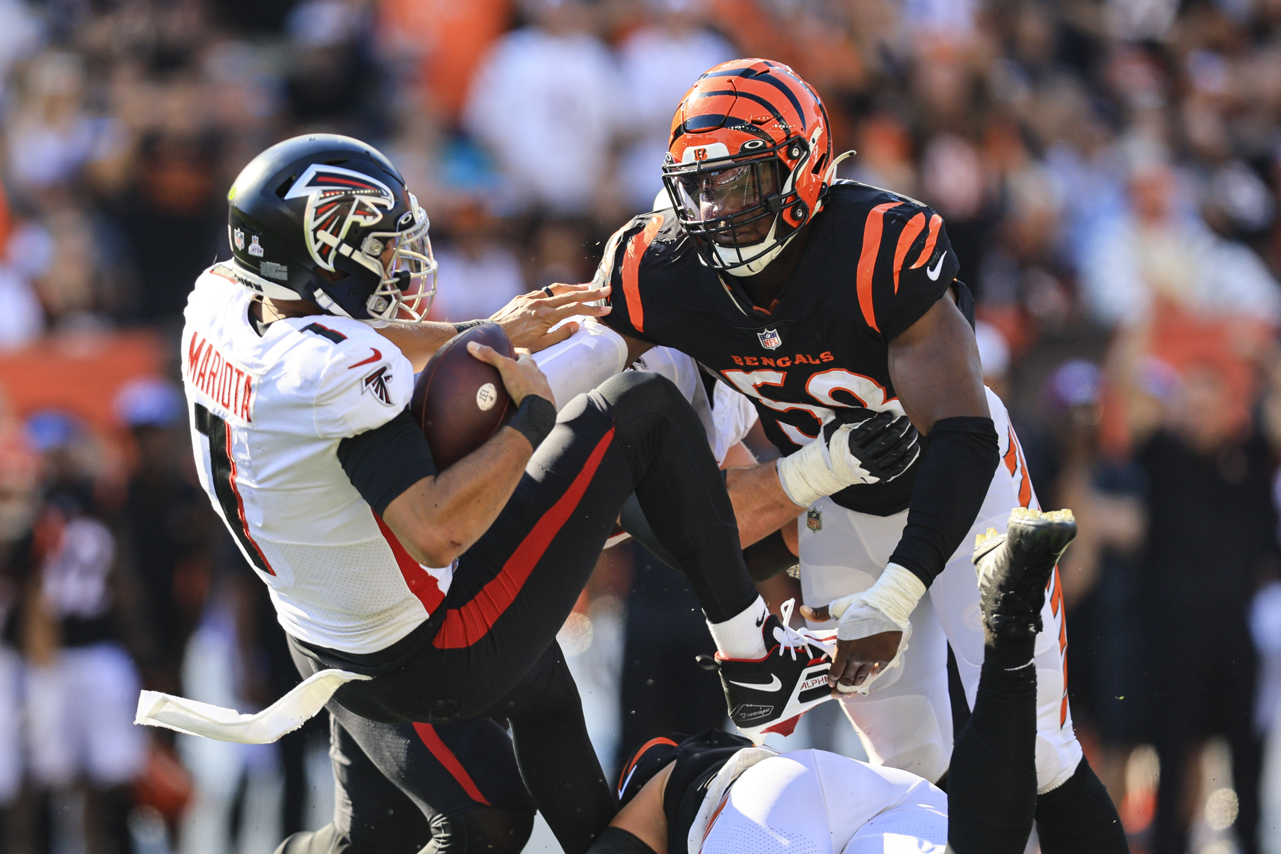 Cincinnati Bengals defensive end Joseph Ossai (58) celebrates from