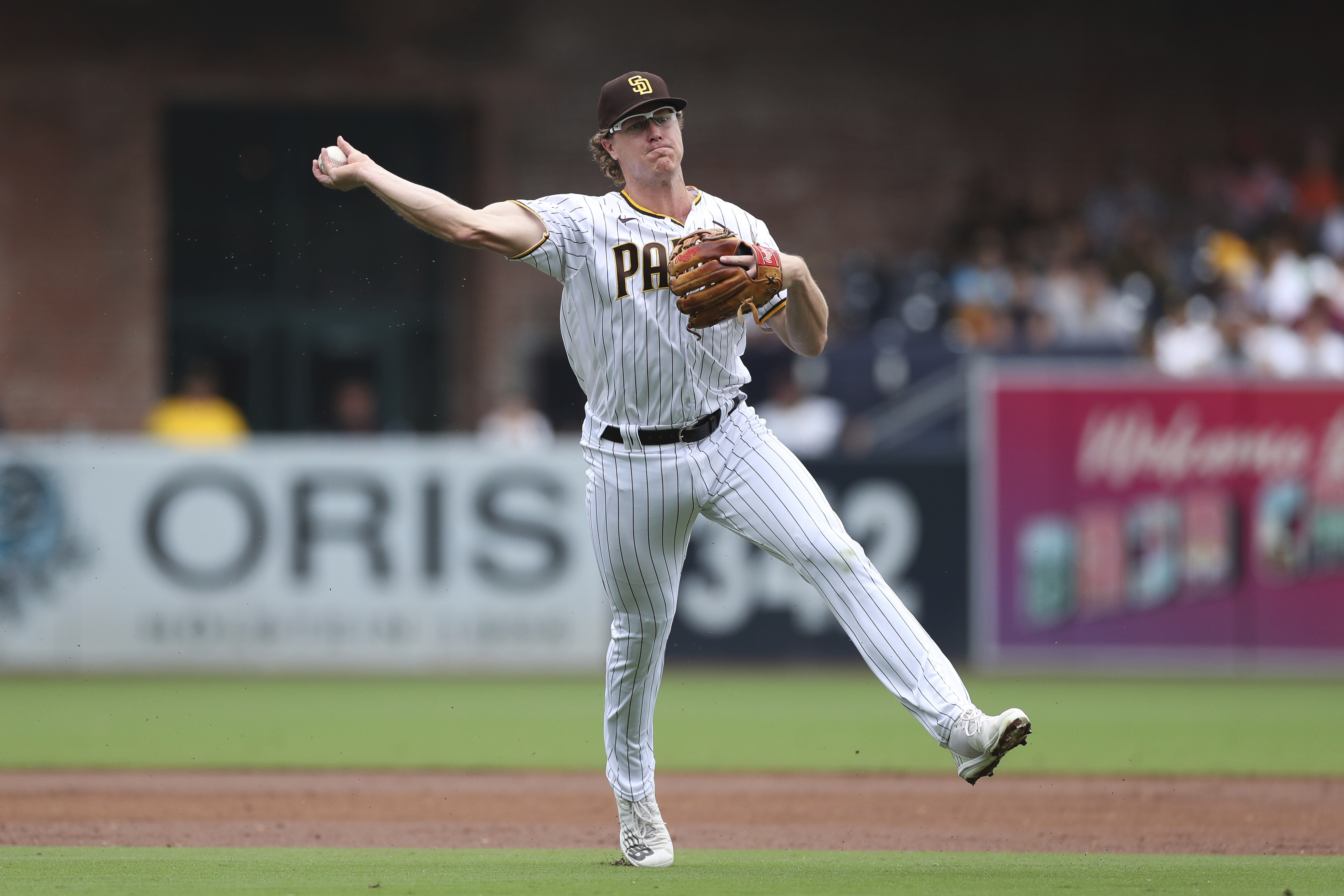 San Francisco Giants third baseman Wilmer Flores throws out San Diego  Padres' Jose Azocar at first base during the third inning of a baseball  game in San Francisco, Wednesday, Sept. 27, 2023. (