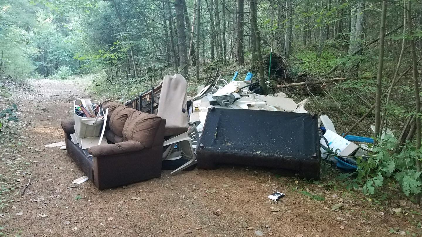 truckloads of dumped household trash in Monson