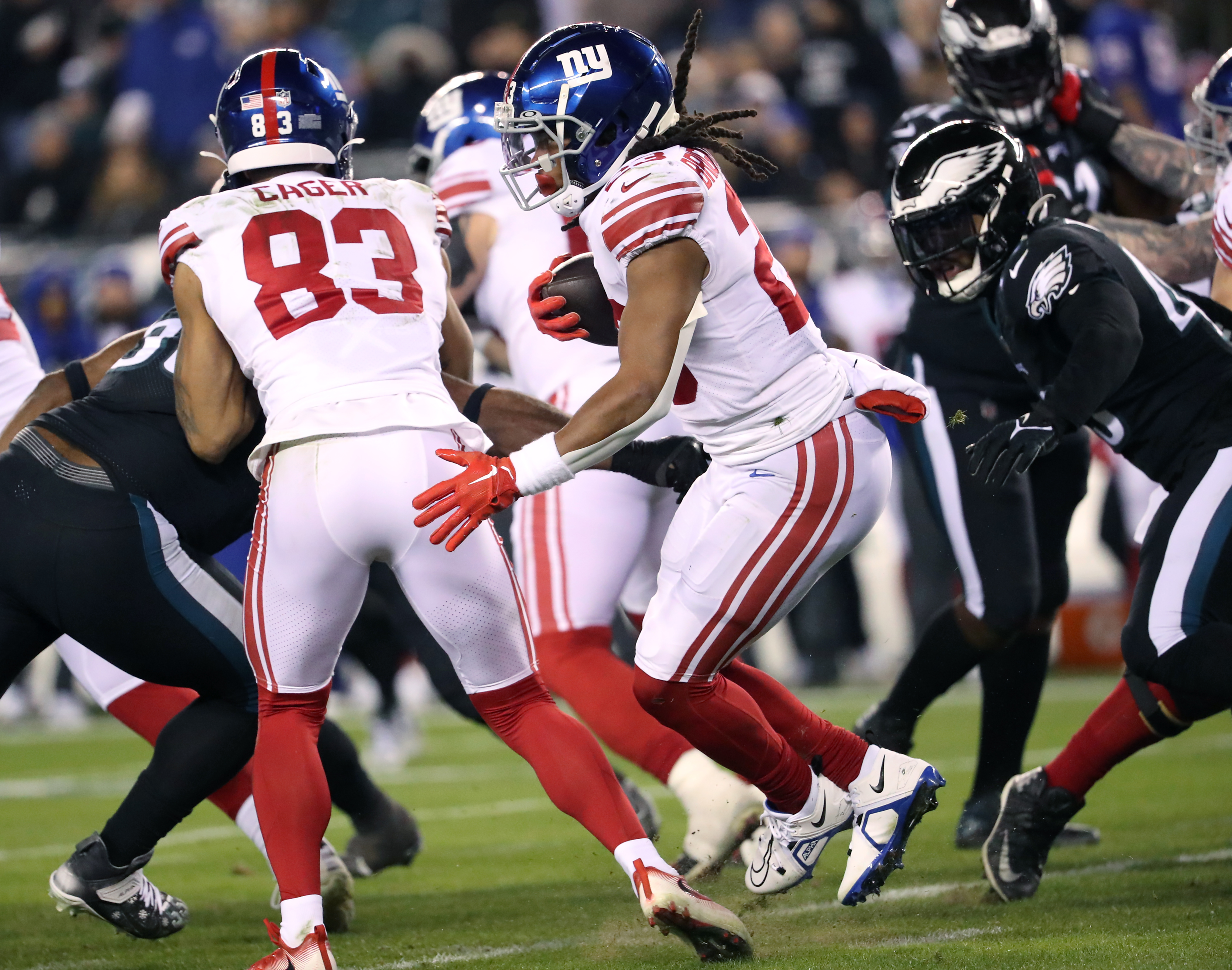 MINNEAPOLIS, MN - JANUARY 15: New York Giants running back Saquon Barkley  (26) runs with the ball during the NFL game between the New York Giants and Minnesota  Vikings on January 15th