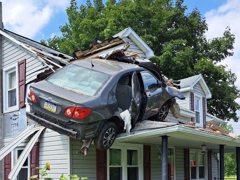 Vehicle crashes into 2nd story of Pa. home: 'There's a car on your